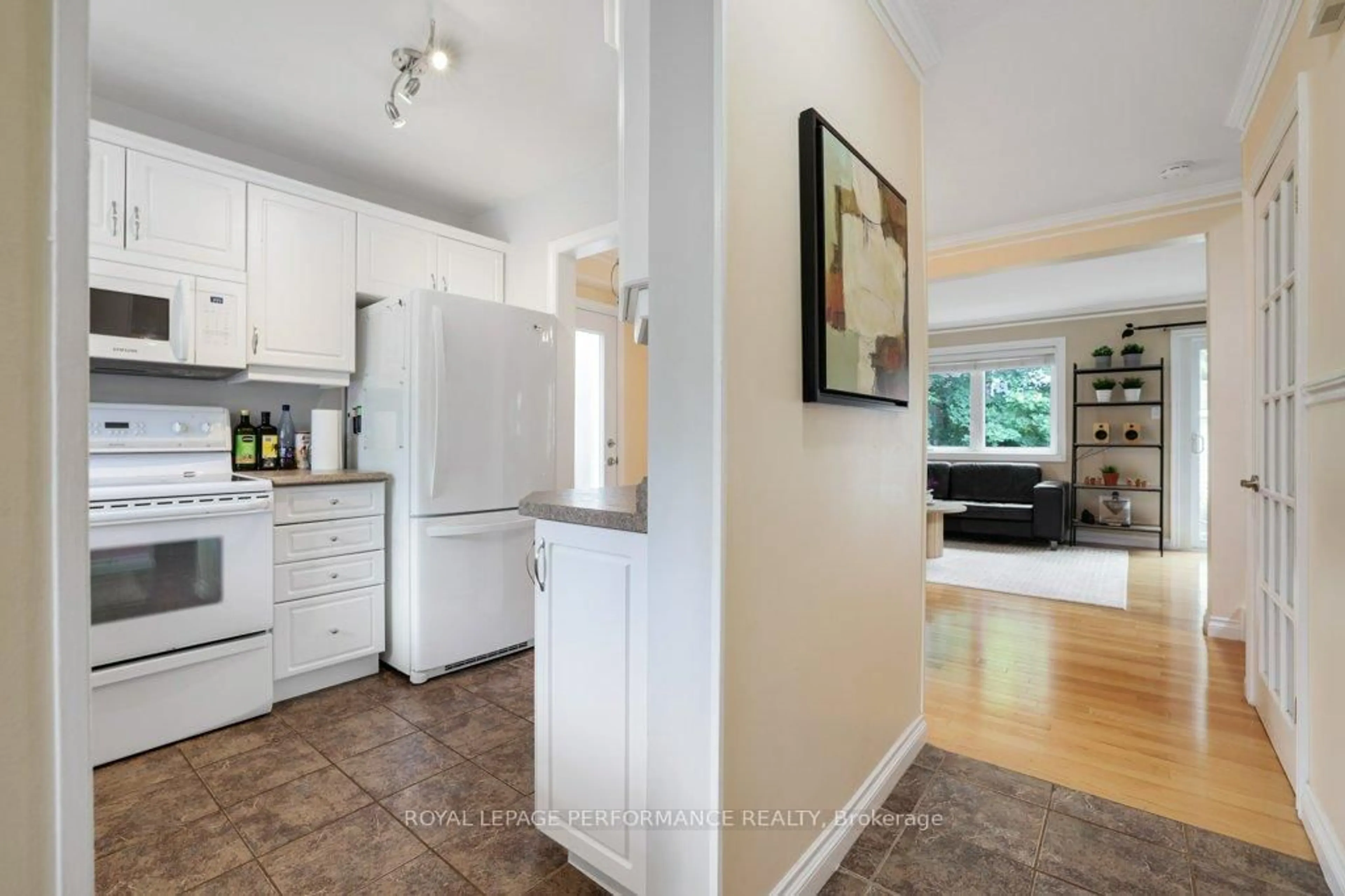 Open concept kitchen, ceramic/tile floor for 1550 Bourcier Dr, Ottawa Ontario K1E 3J2