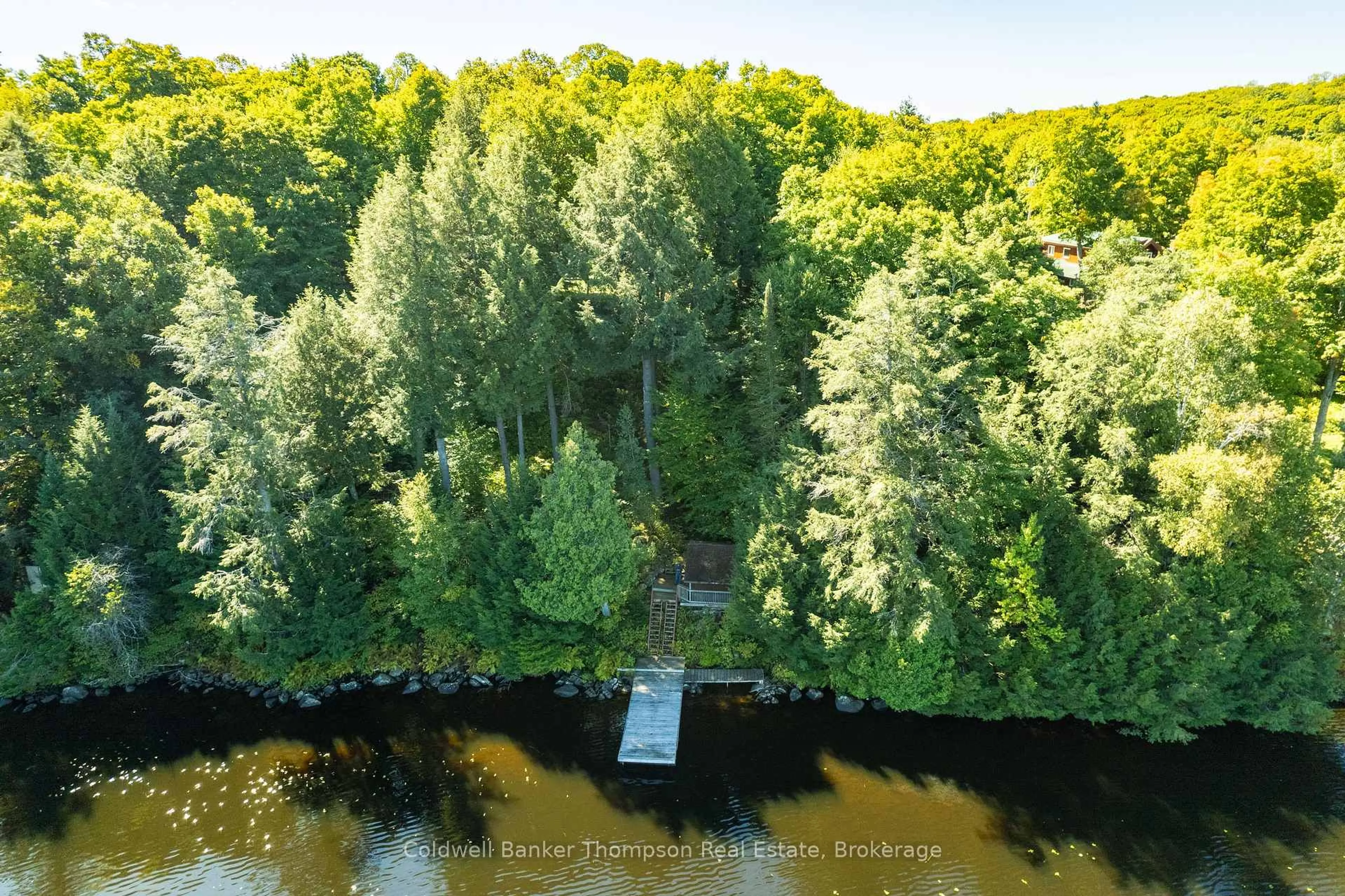 A pic from outside/outdoor area/front of a property/back of a property/a pic from drone, water/lake/river/ocean view for 115 Sandwood Dr, Burk's Falls Ontario P0A 1C0