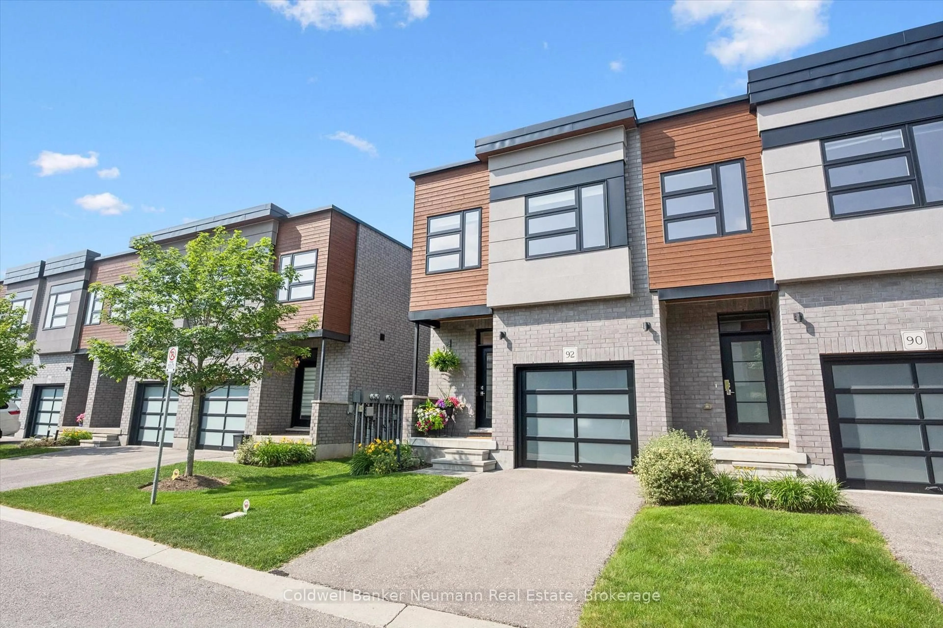 Home with brick exterior material, street for 60 Arkell Rd #92, Guelph Ontario N1L 0N8