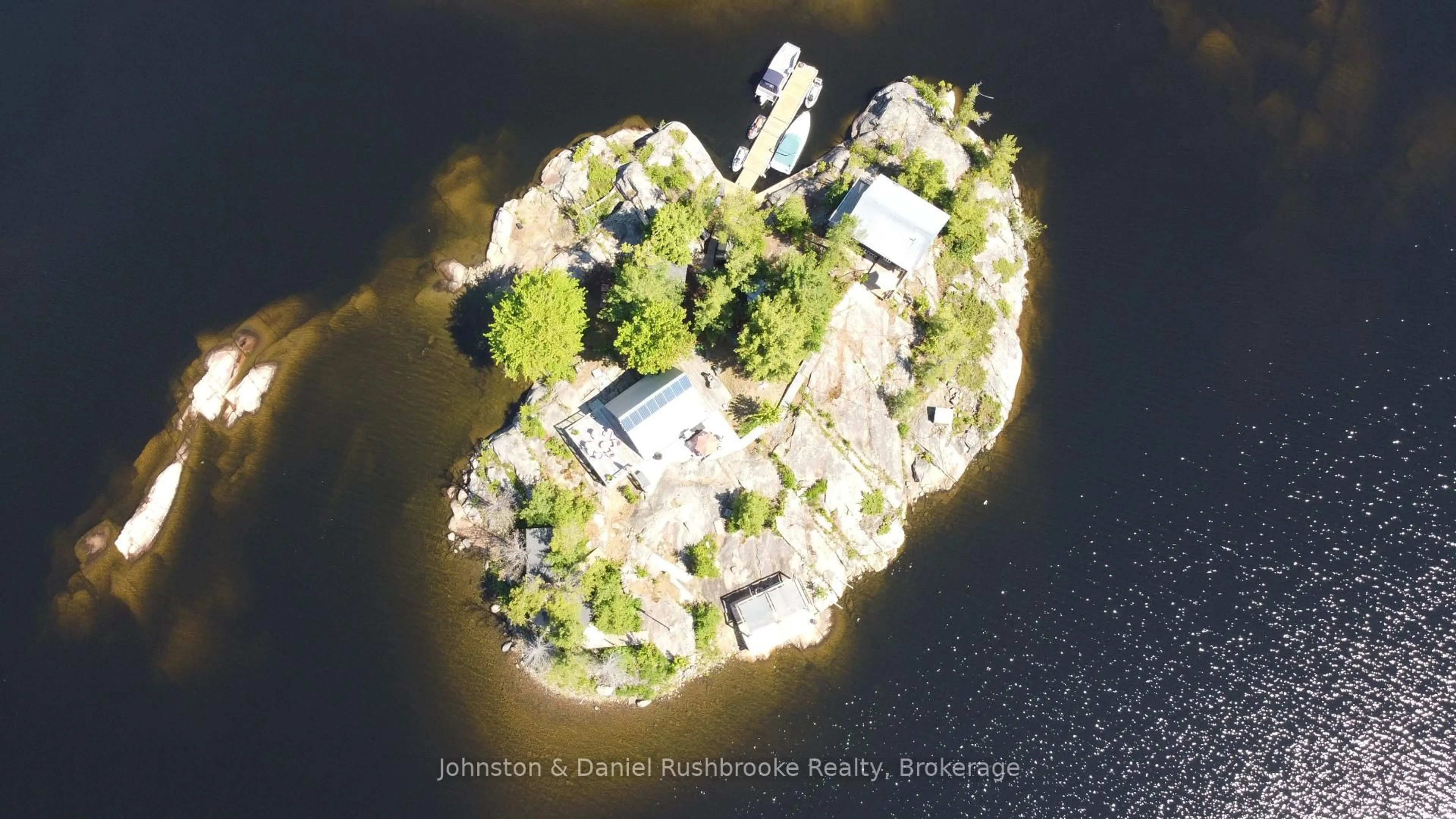 A pic from outside/outdoor area/front of a property/back of a property/a pic from drone, water/lake/river/ocean view for 1 B244 (Conger) Island, The Archipelago Ontario P2A 1T0