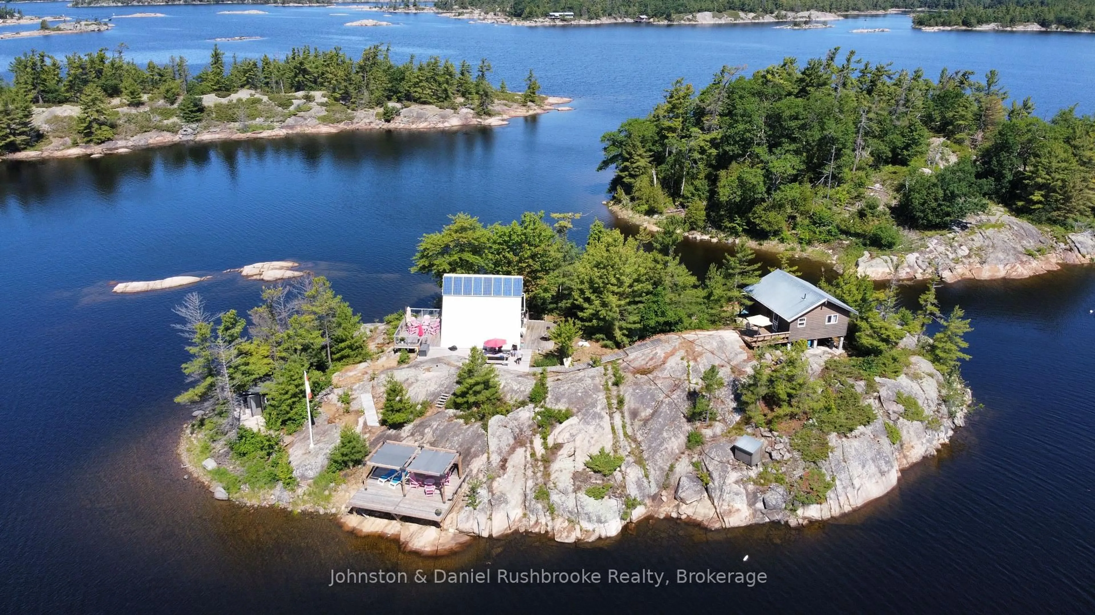 A pic from outside/outdoor area/front of a property/back of a property/a pic from drone, water/lake/river/ocean view for 1 B244 (Conger) Island, The Archipelago Ontario P2A 1T0