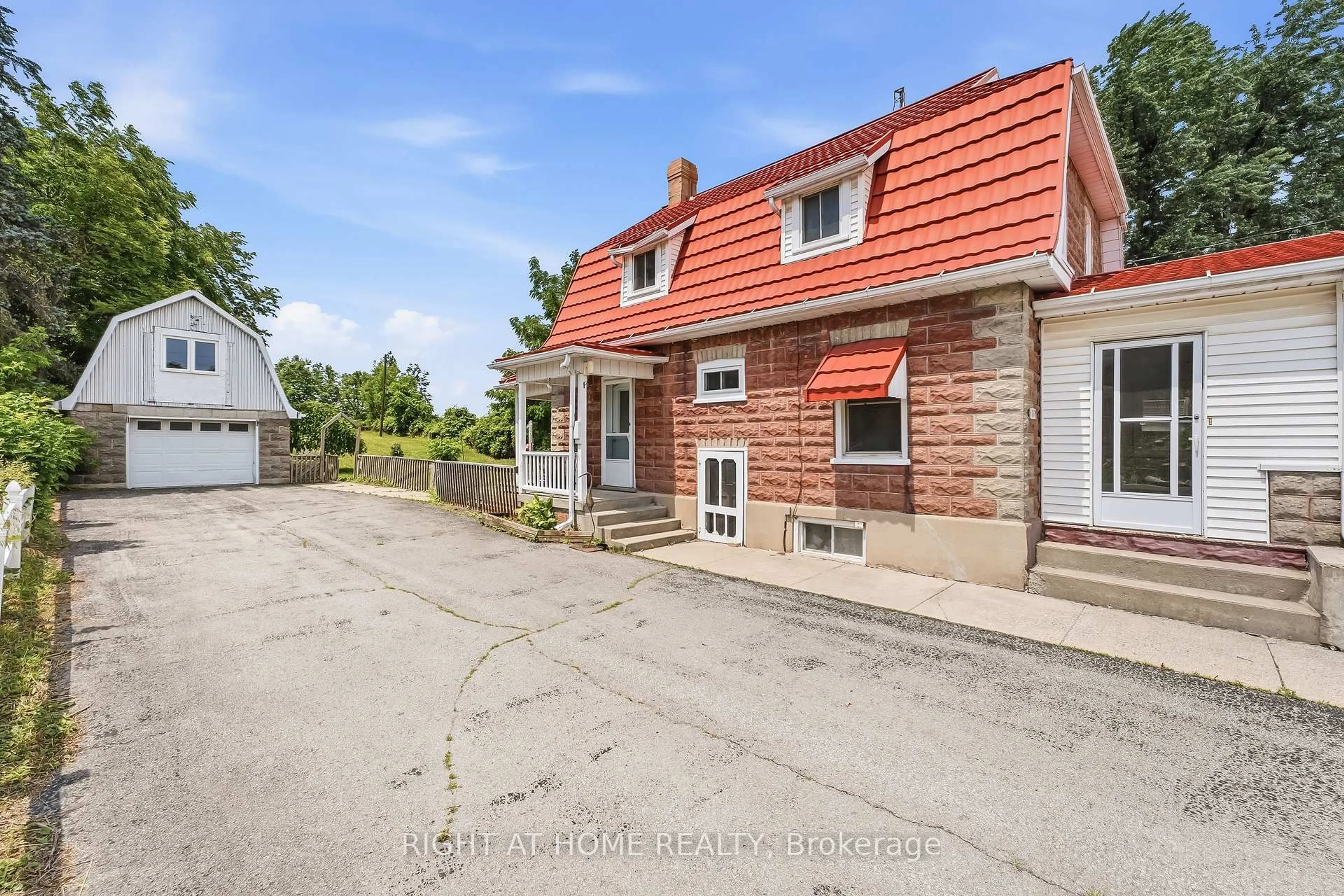 A pic from outside/outdoor area/front of a property/back of a property/a pic from drone, street for 9140 County Rd 45, Alnwick/Haldimand Ontario K0K 2X0