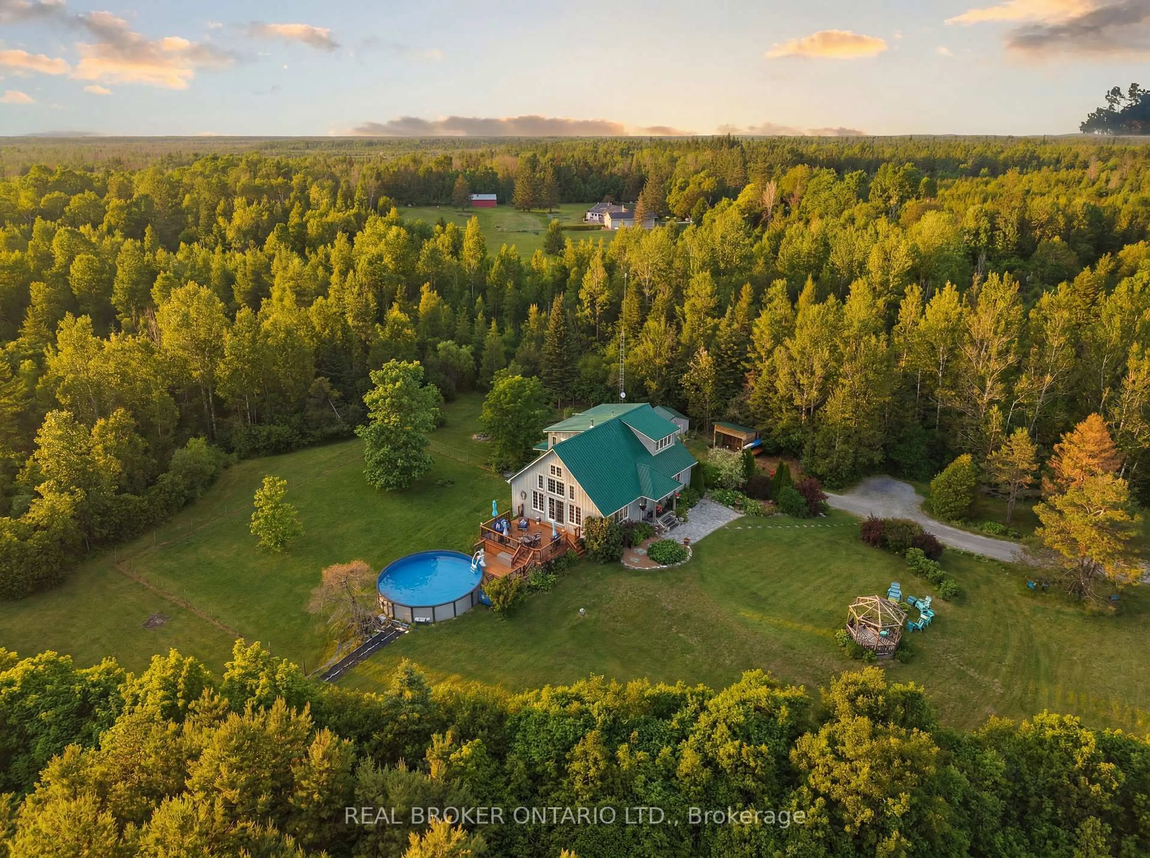 A pic from outside/outdoor area/front of a property/back of a property/a pic from drone, forest/trees view for 7198 Harnett Rd, North Gower Ontario K0A 2T0