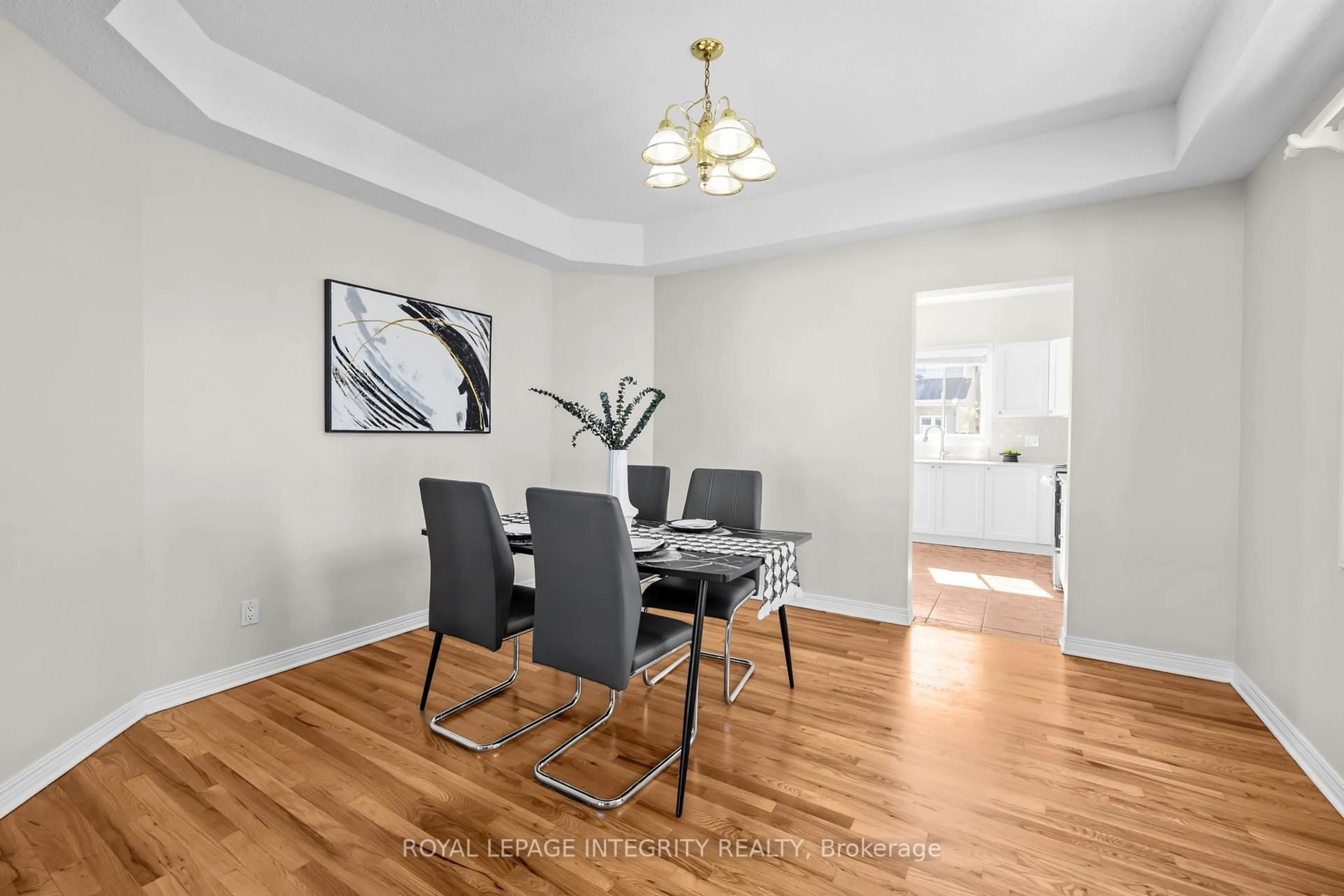 Dining room, wood/laminate floor for 4 Tamarack Pl, Ottawa Ontario K2J 4R3
