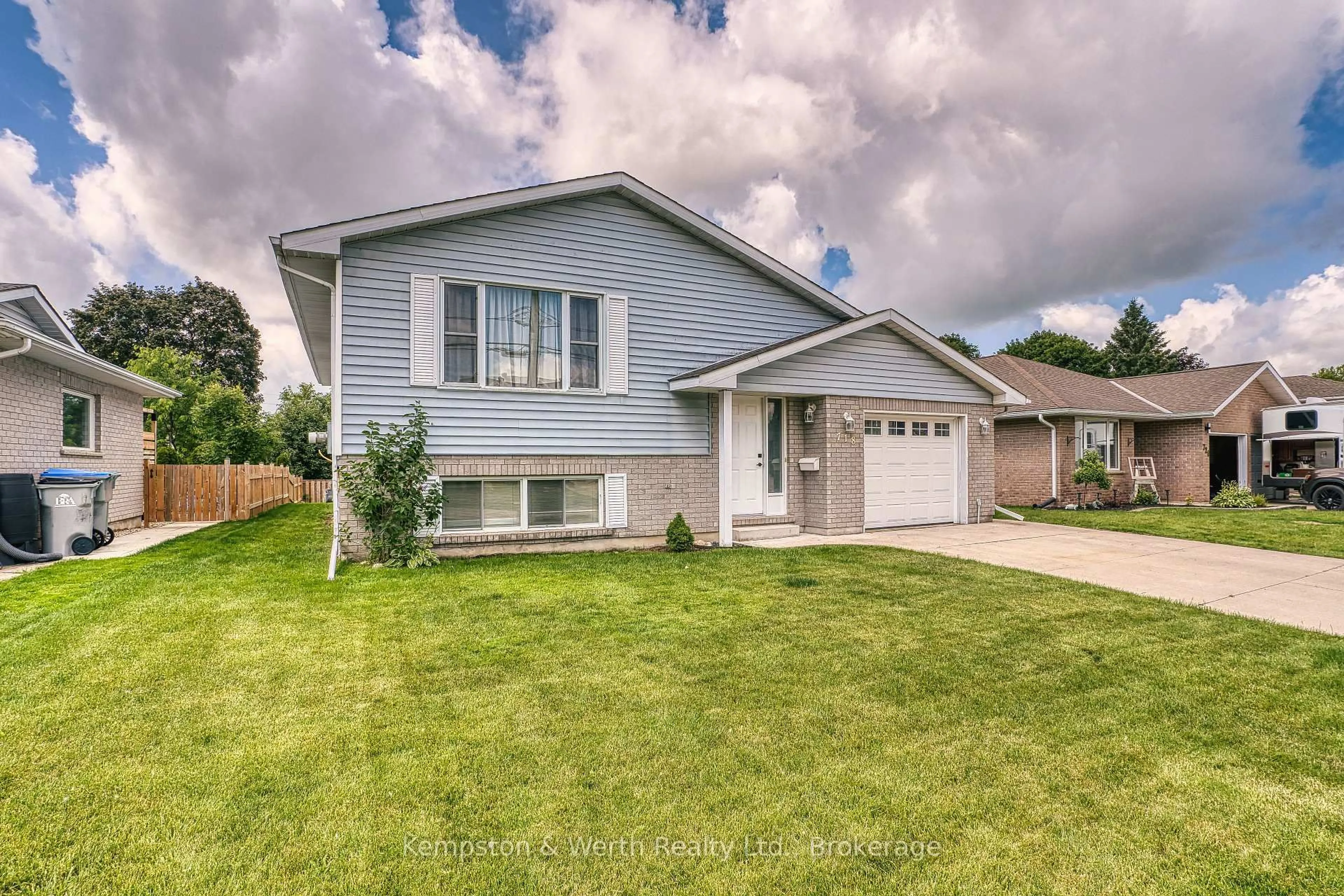 Home with vinyl exterior material, street for 718 Edgar St, North Perth Ontario N4W 1H6