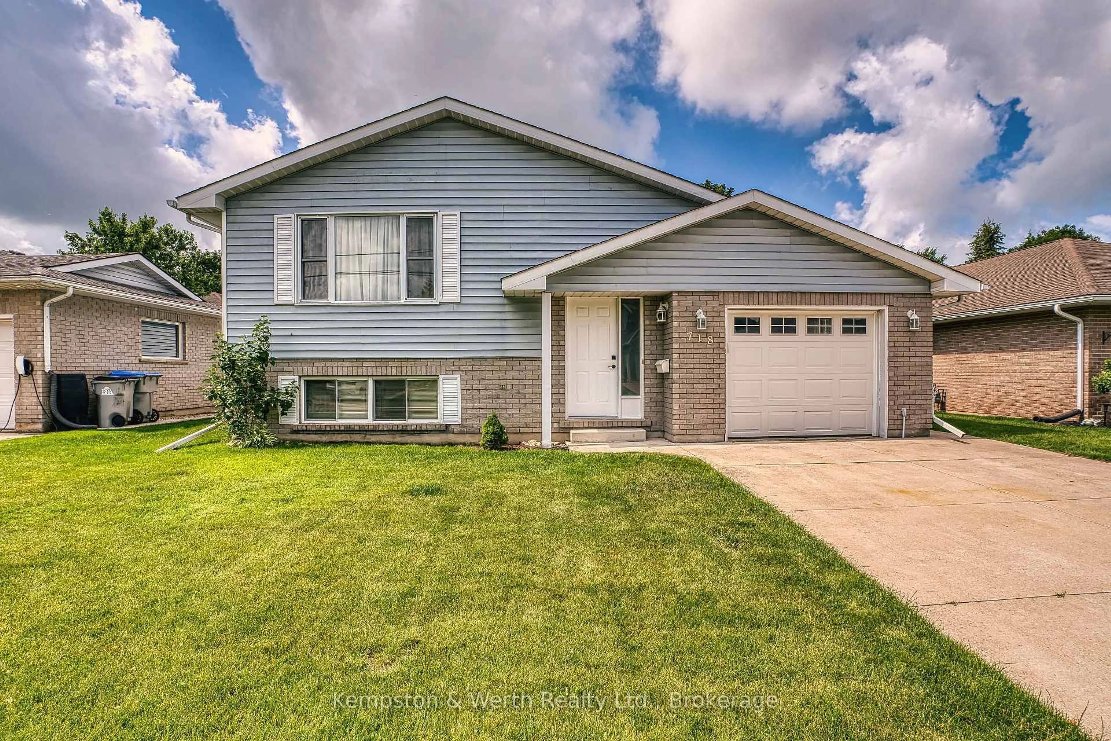 Home with vinyl exterior material, street for 718 Edgar St, North Perth Ontario N4W 1H6