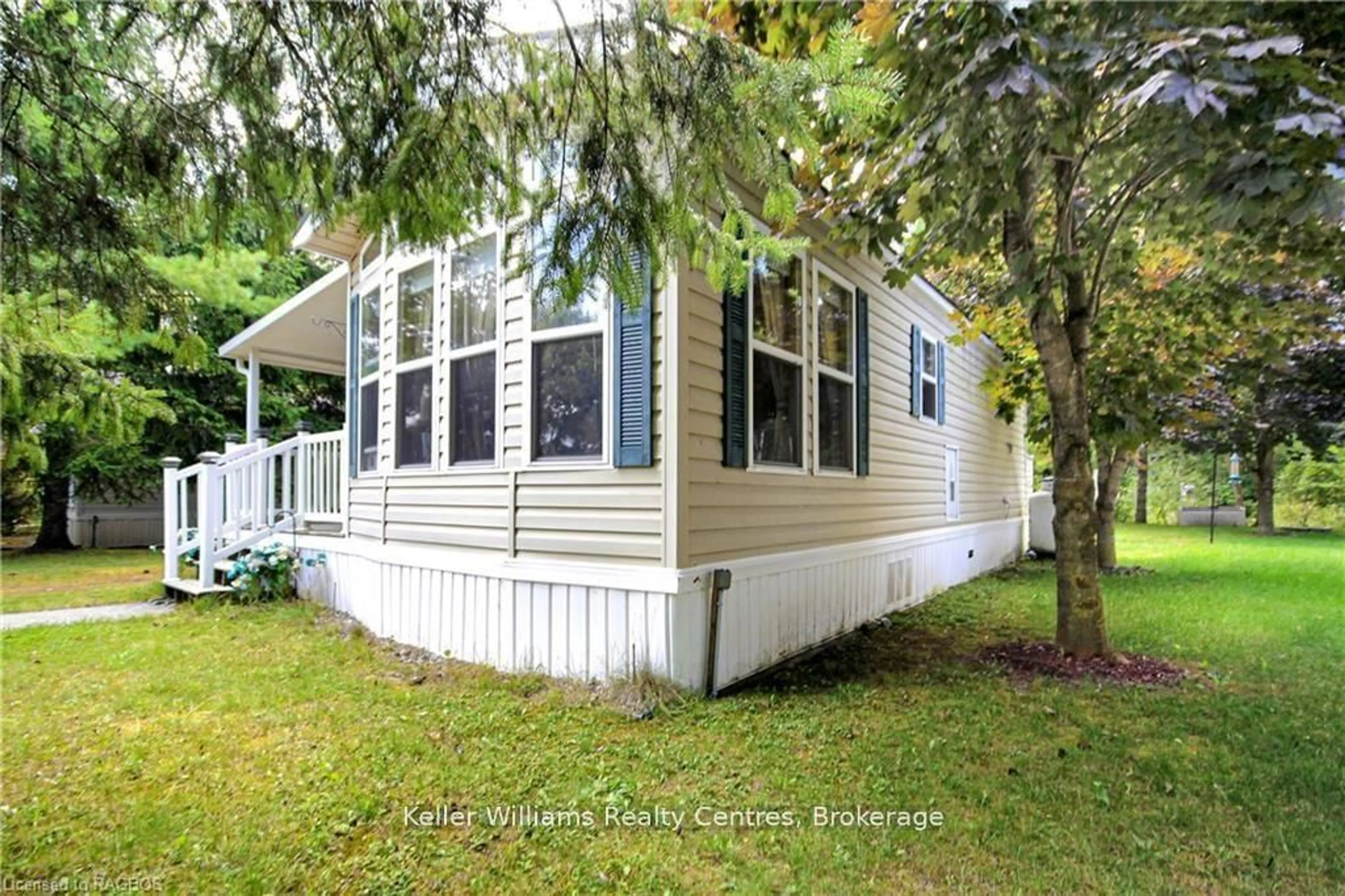 Home with vinyl exterior material, street for 13 Southline Ave #M44, Huron-Kinloss Ontario N0G 2B0