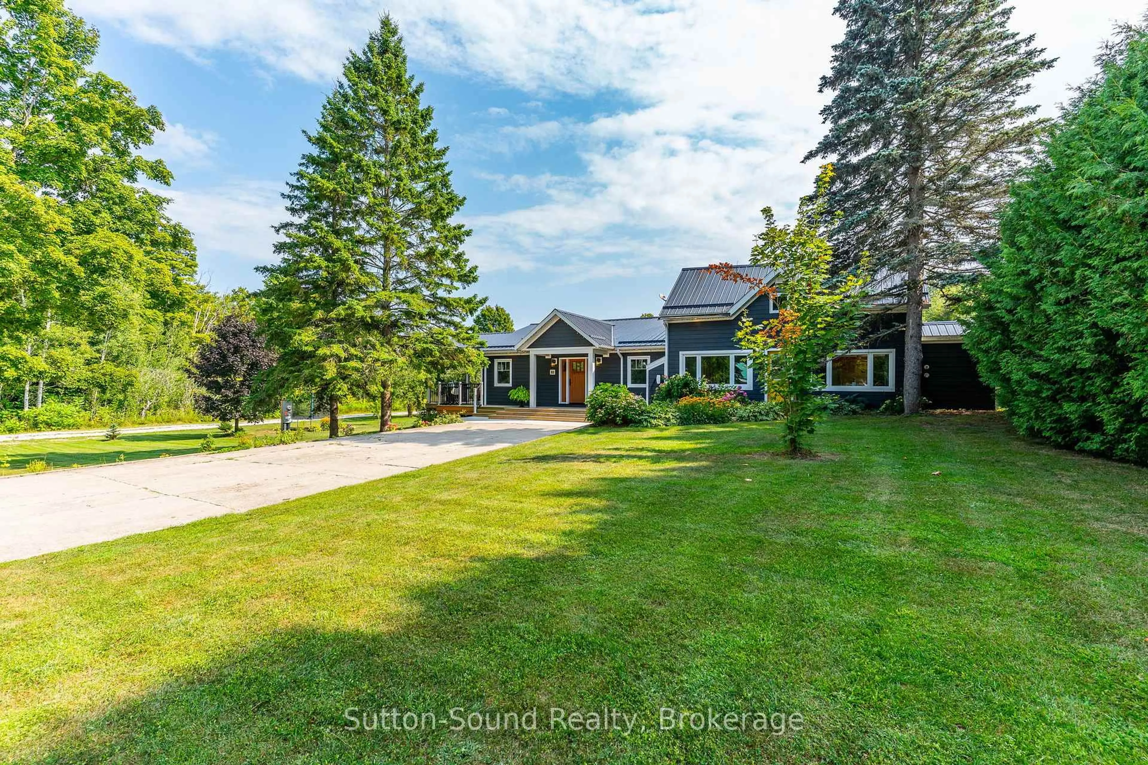 A pic from outside/outdoor area/front of a property/back of a property/a pic from drone, water/lake/river/ocean view for 87 Meadowland Rd, South Bruce Peninsula Ontario N0H 2T0