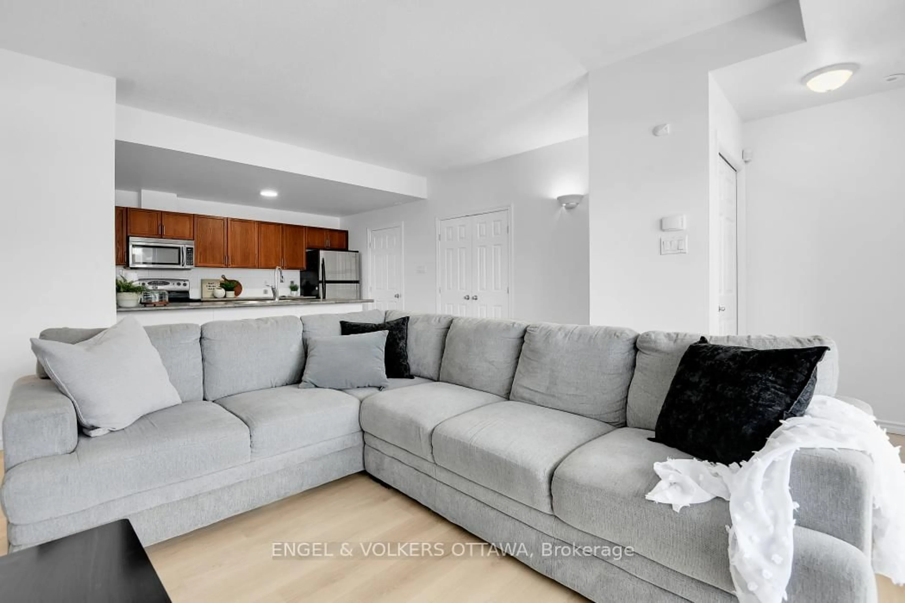 Living room with furniture, unknown for 165 Waterbridge Dr #5, Ottawa Ontario K2G 7G3