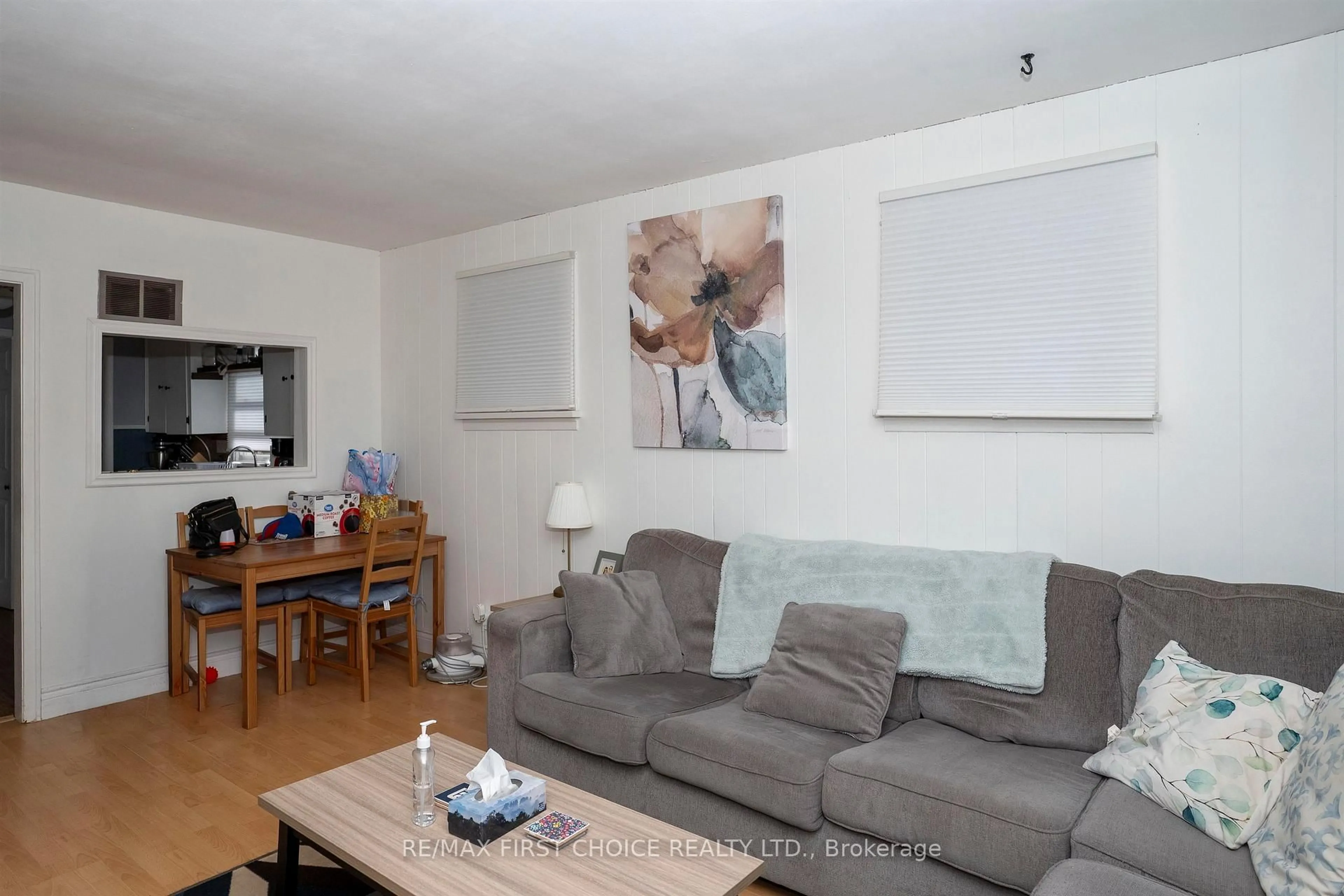 Living room with furniture, wood/laminate floor for 262 Brock St, Thunder Bay Ontario P7E 4H4