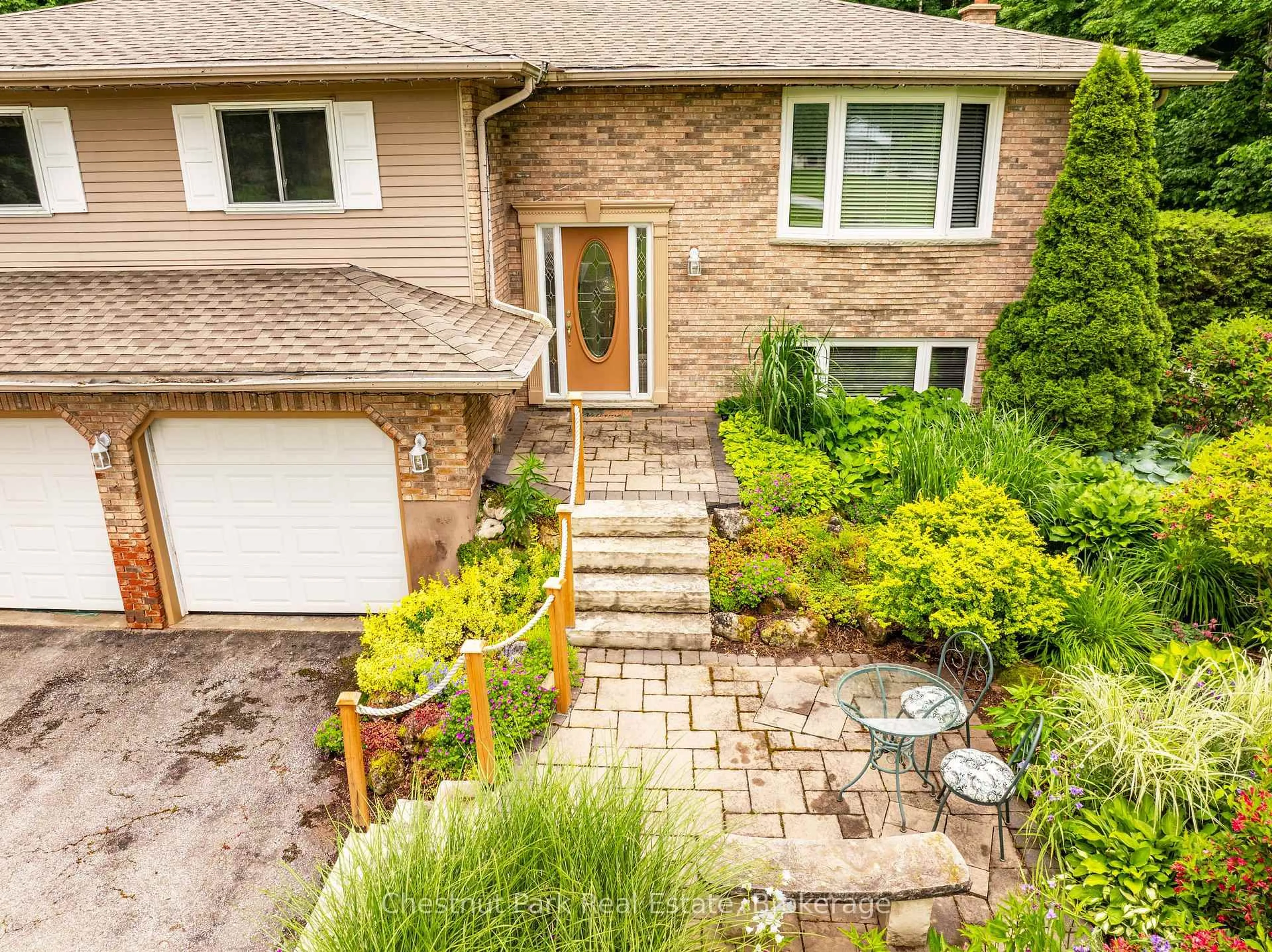 Home with brick exterior material, street for 280134 Sideroad 15, Georgian Bluffs Ontario N0H 2K0