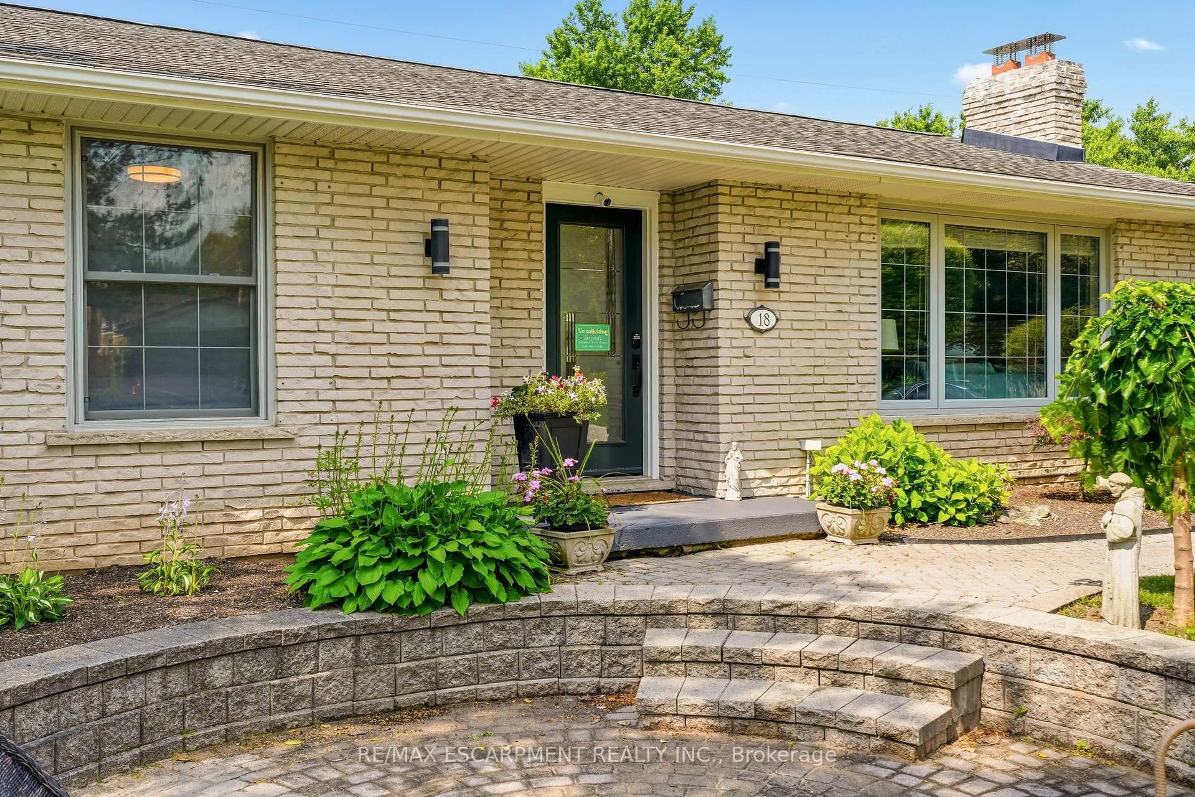 Home with brick exterior material, street for 18 Fireside Dr, Hamilton Ontario L8N 2Z7