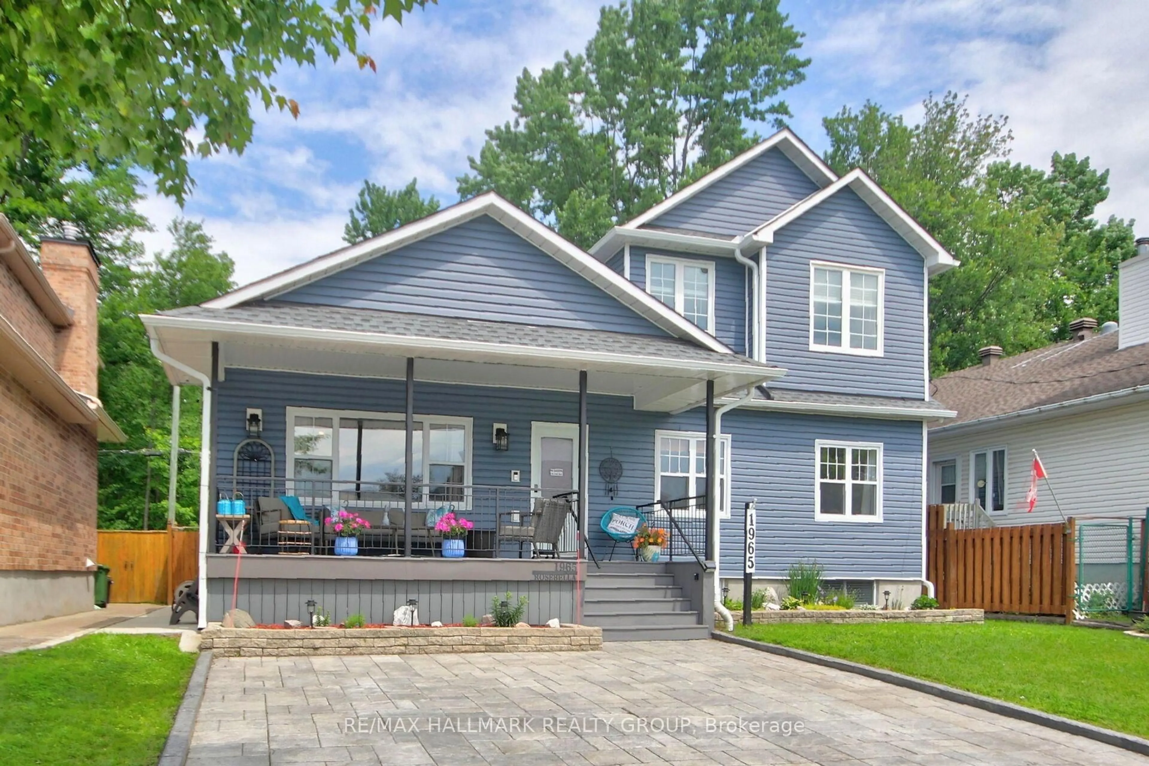 Home with vinyl exterior material, street for 1965 Rosebella Ave, Ottawa Ontario K1T 1G6