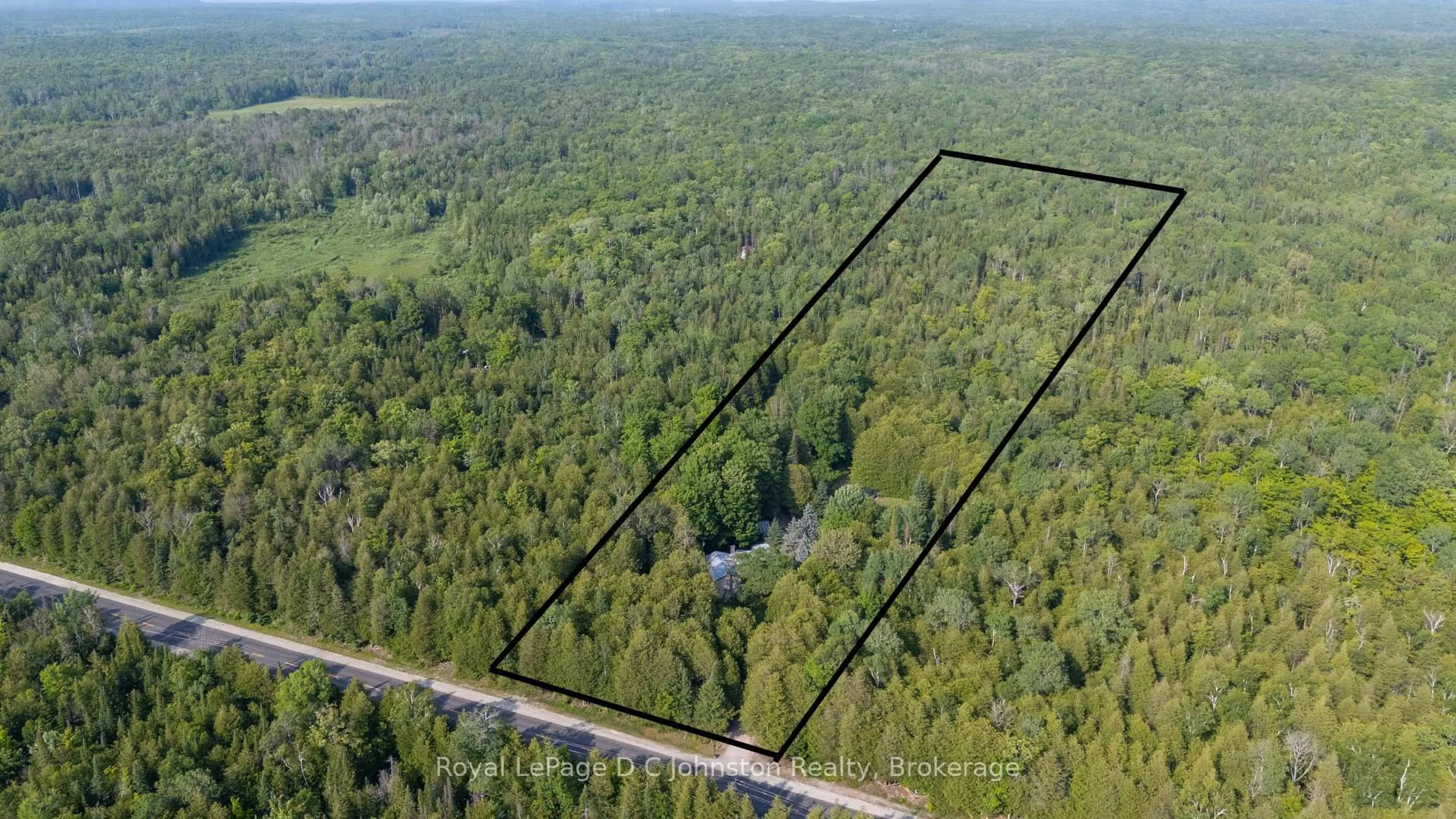 A pic from outside/outdoor area/front of a property/back of a property/a pic from drone, forest/trees view for 711 Bruce Rd 9 Rd, South Bruce Peninsula Ontario N0H 2T0