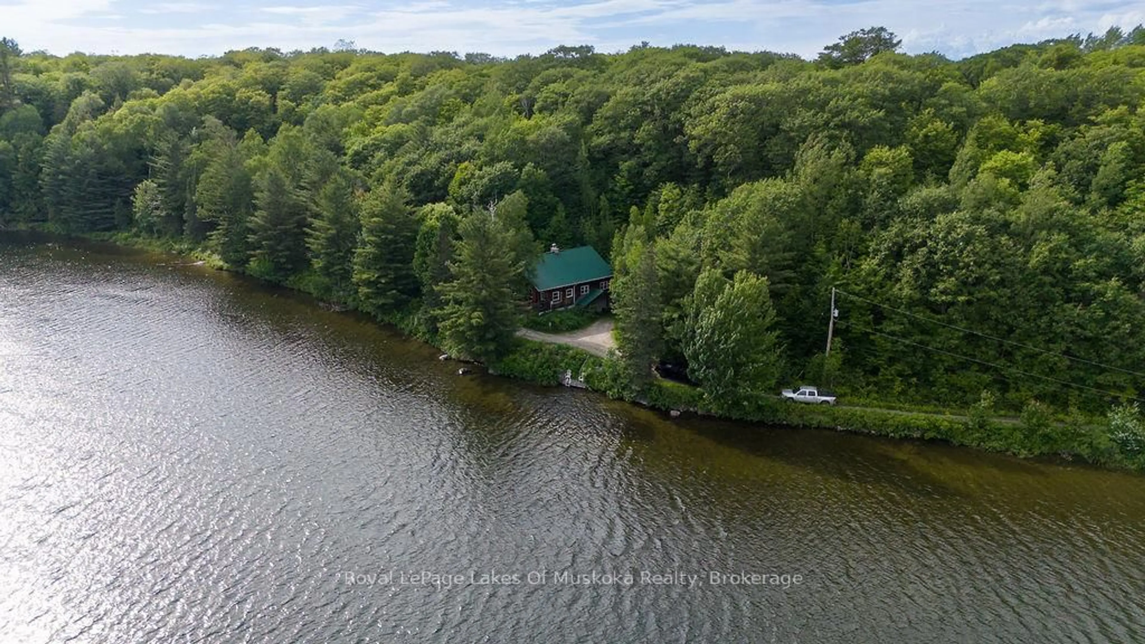 A pic from outside/outdoor area/front of a property/back of a property/a pic from drone, water/lake/river/ocean view for 2245 Ahmic Lake Rd, Magnetawan Ontario P0A 1P0