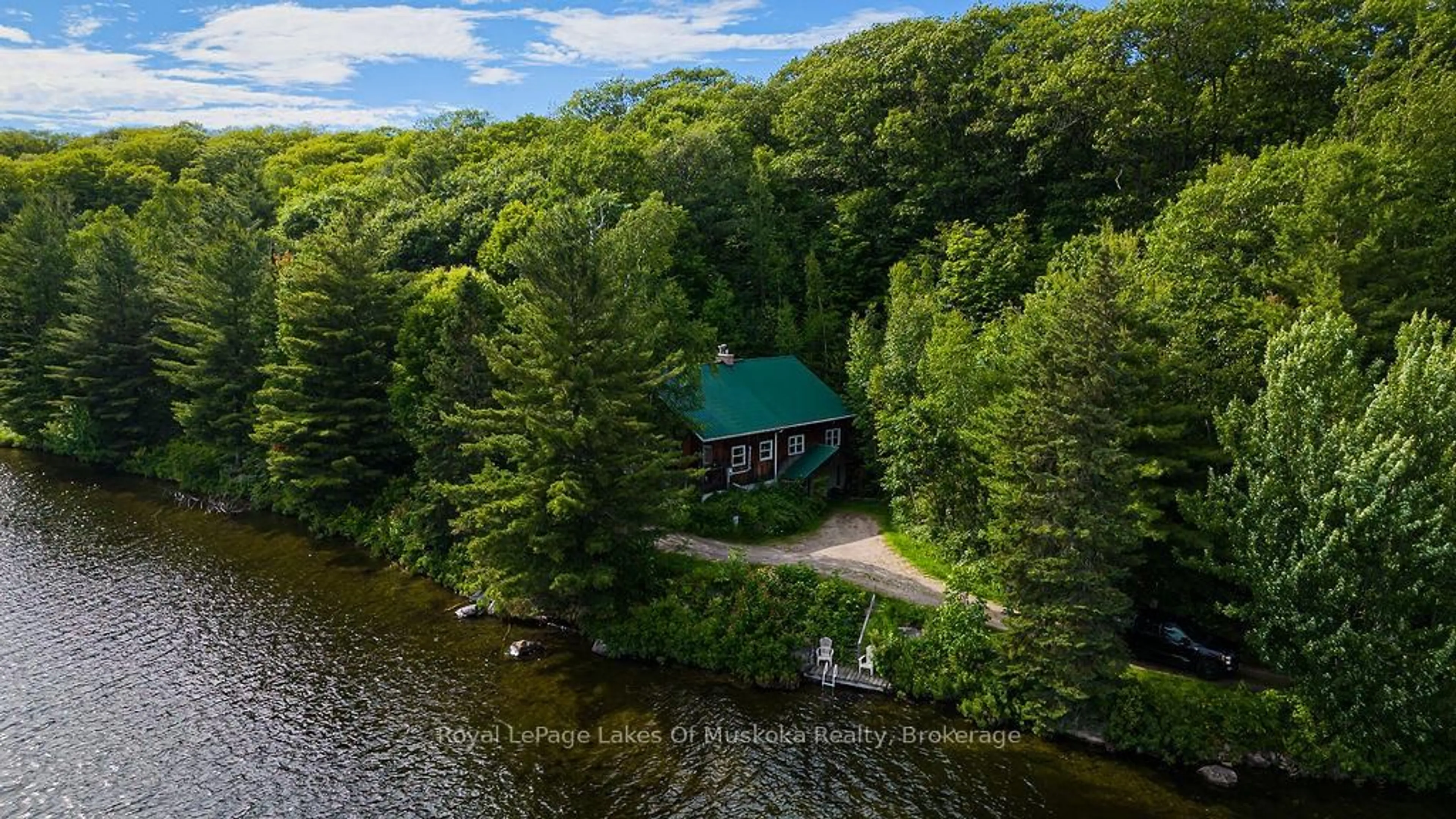 A pic from outside/outdoor area/front of a property/back of a property/a pic from drone, water/lake/river/ocean view for 2245 Ahmic Lake Rd, Magnetawan Ontario P0A 1P0