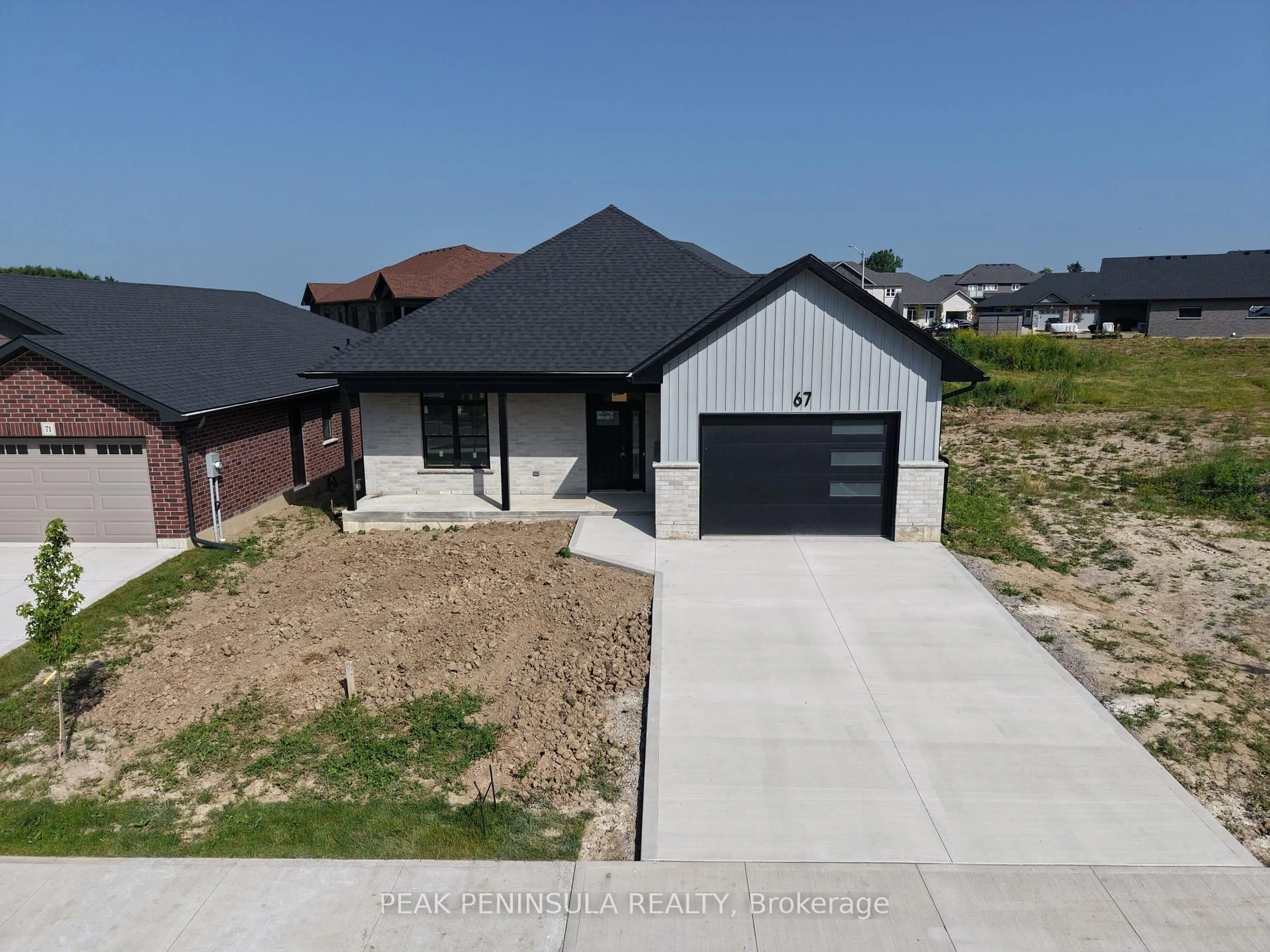 A pic from outside/outdoor area/front of a property/back of a property/a pic from drone, street for 67 Hunter Dr, Norfolk Ontario N0E 1M0