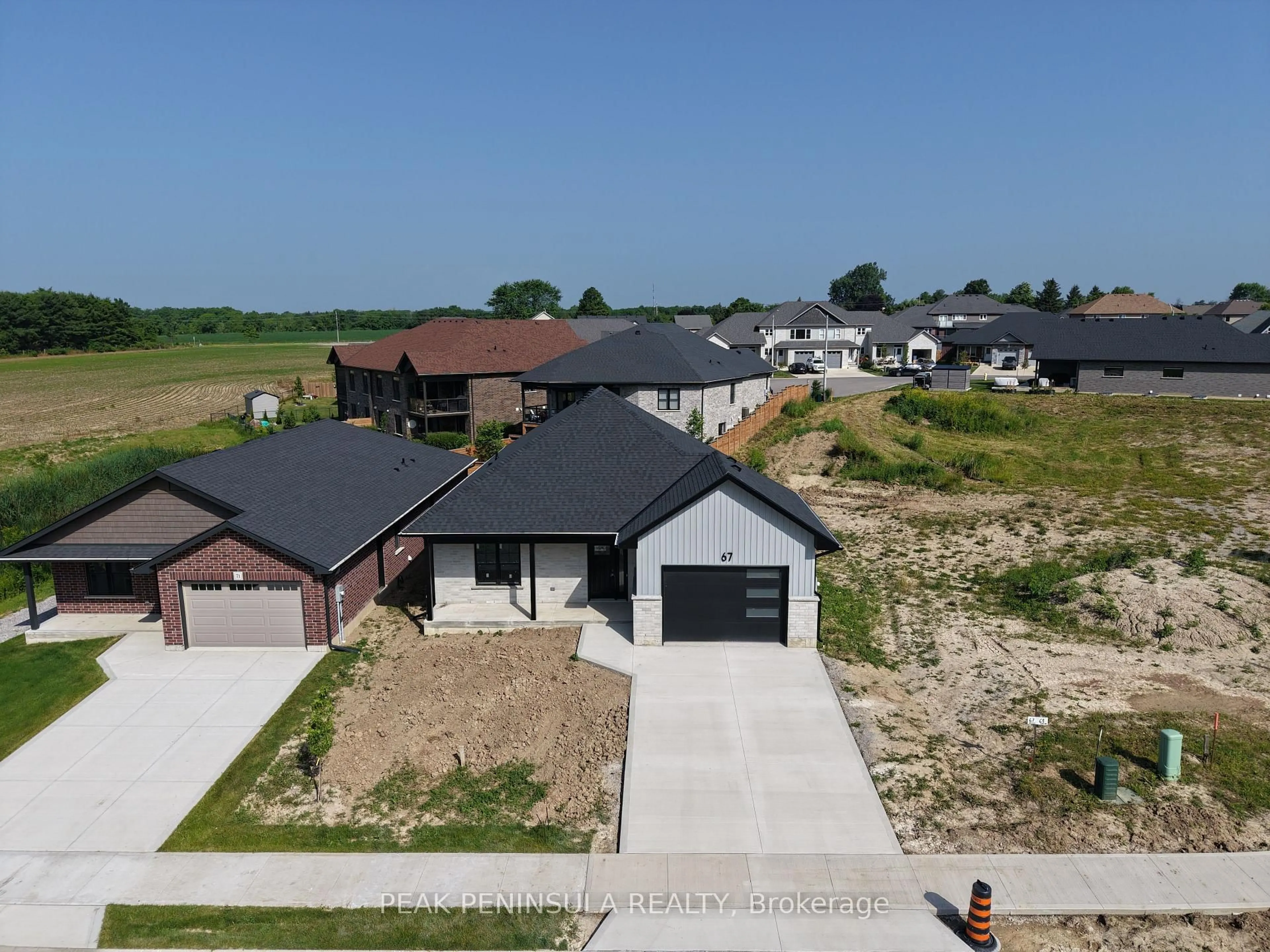 A pic from outside/outdoor area/front of a property/back of a property/a pic from drone, street for 67 Hunter Dr, Norfolk Ontario N0E 1M0