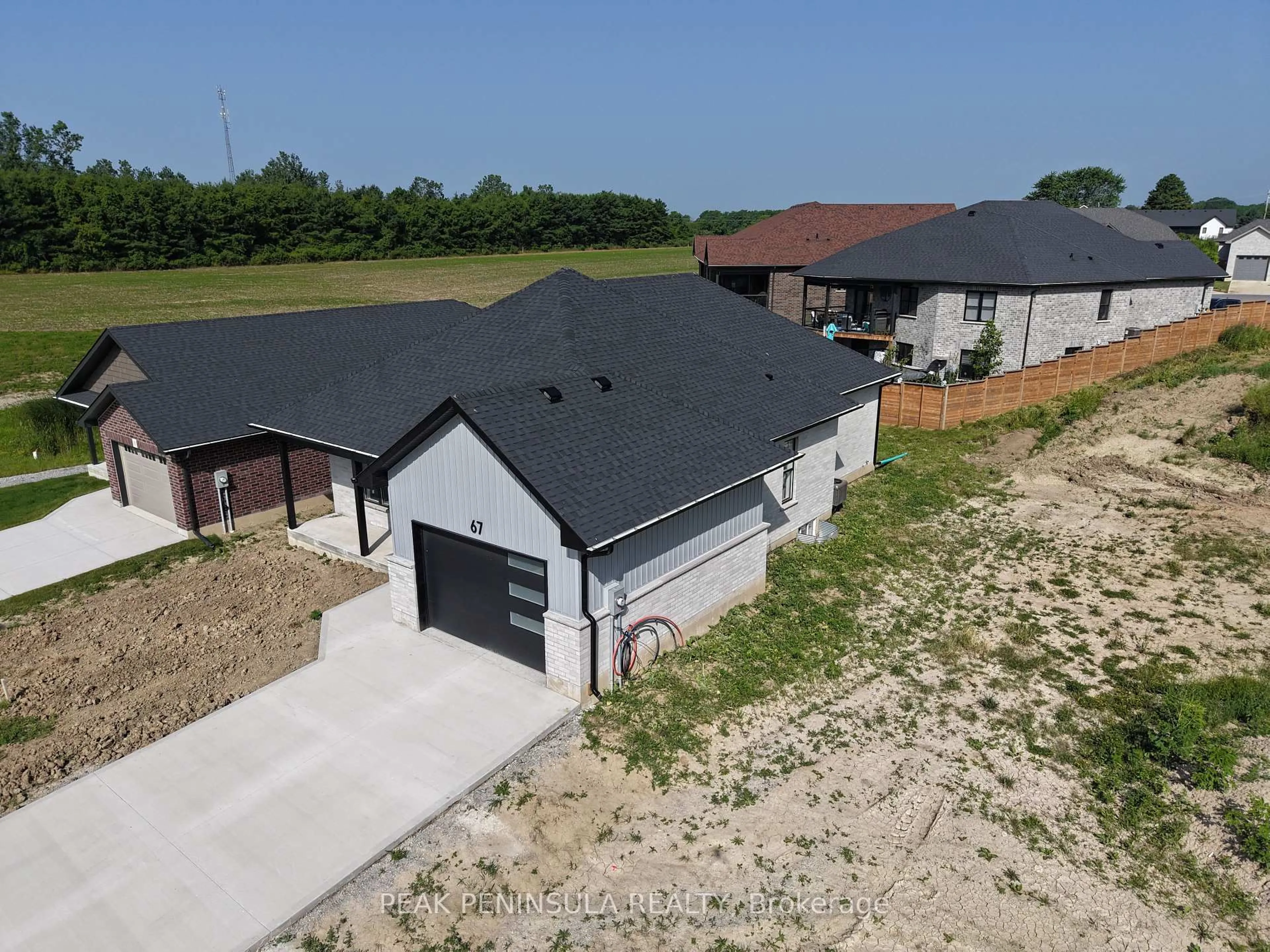 A pic from outside/outdoor area/front of a property/back of a property/a pic from drone, building for 67 Hunter Dr, Norfolk Ontario N0E 1M0
