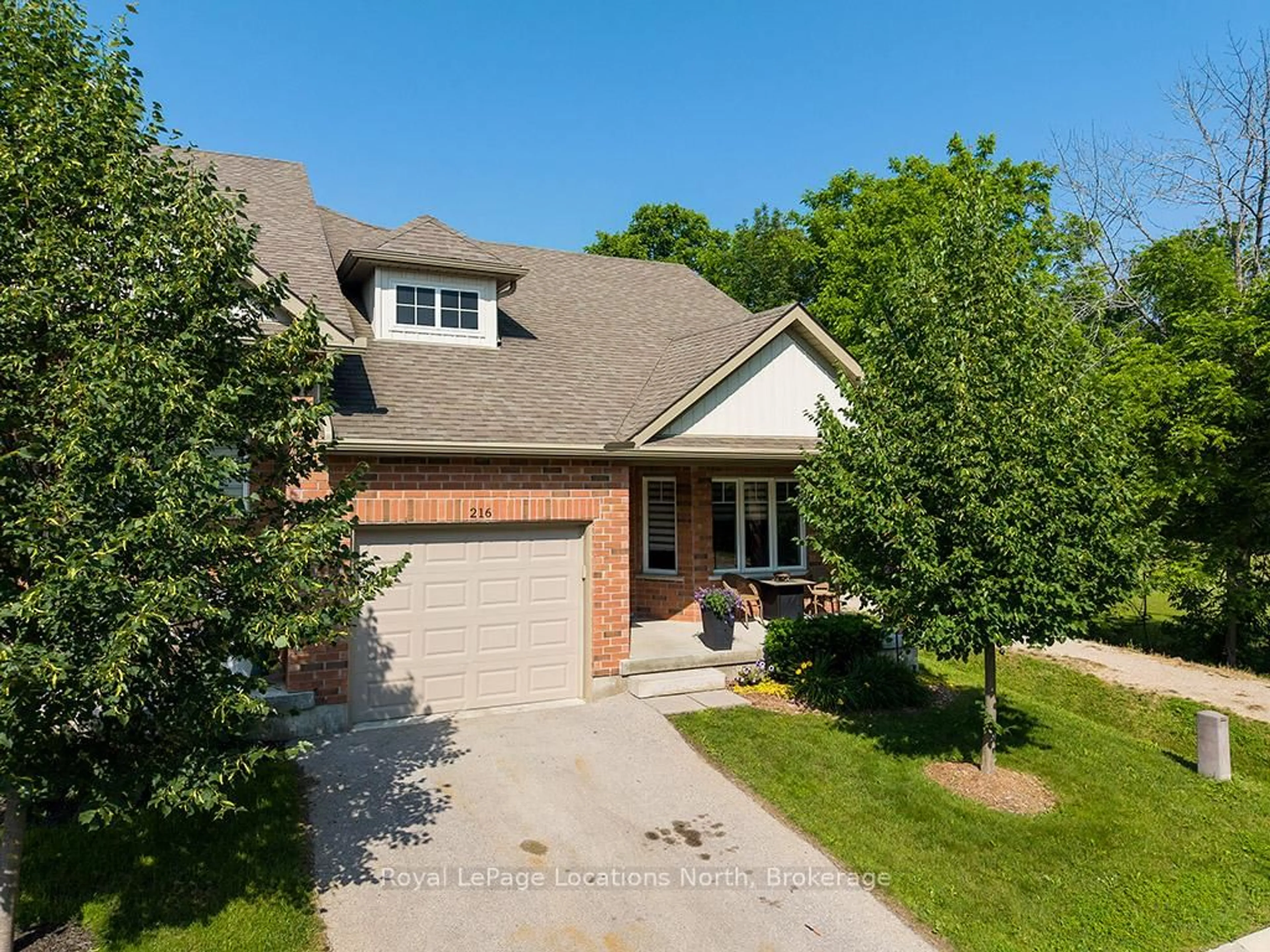 Home with brick exterior material, street for 216 Macintosh Lane, Meaford Ontario N4L 0A5