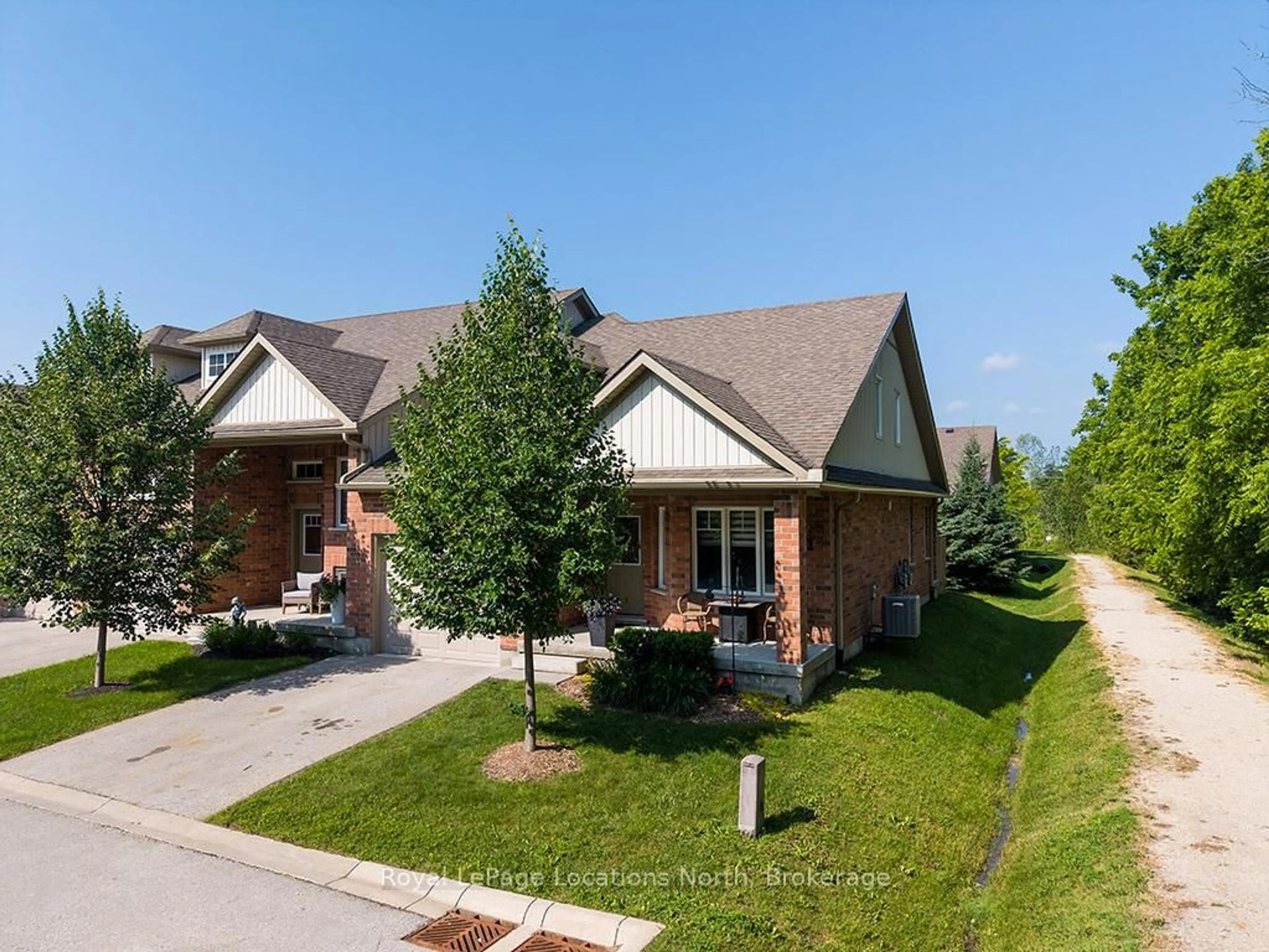 Home with brick exterior material, street for 216 Macintosh Lane, Meaford Ontario N4L 0A5