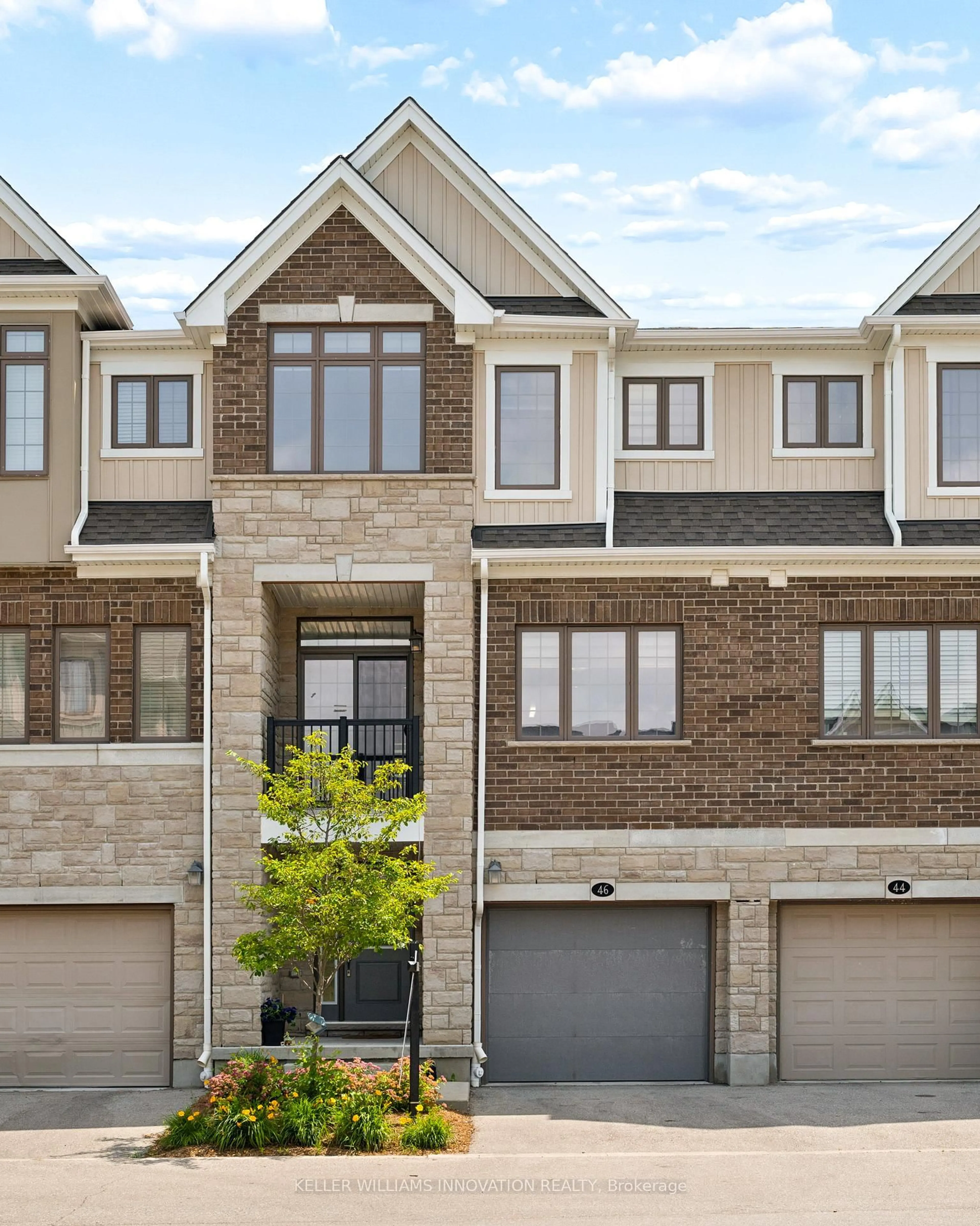 Home with brick exterior material, street for 46 Bank Swallow Cres, Kitchener Ontario N2P 0J7
