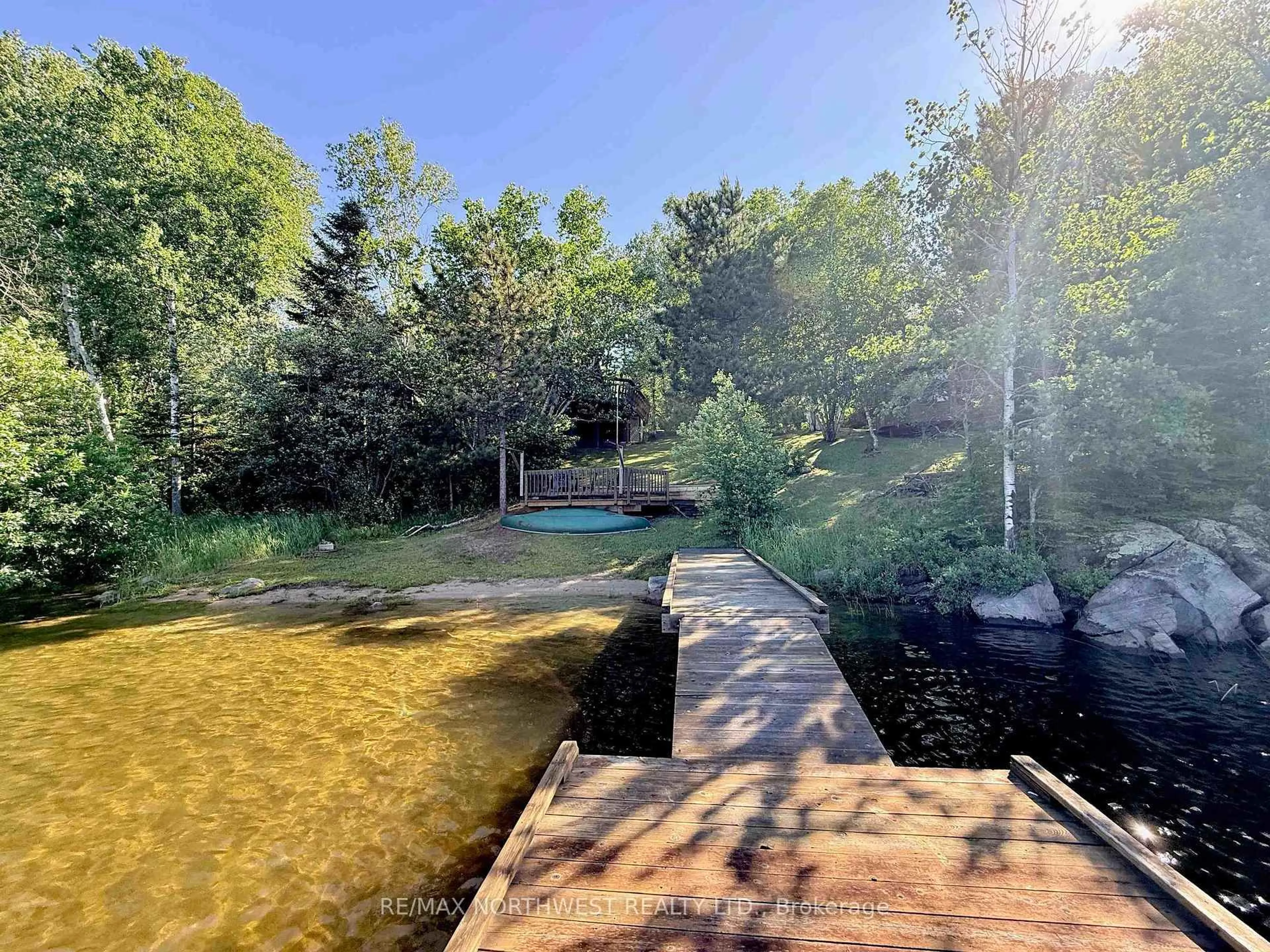 A pic from outside/outdoor area/front of a property/back of a property/a pic from drone, water/lake/river/ocean view for 60 Campbell Road, Kenora Ontario P9N 4N3