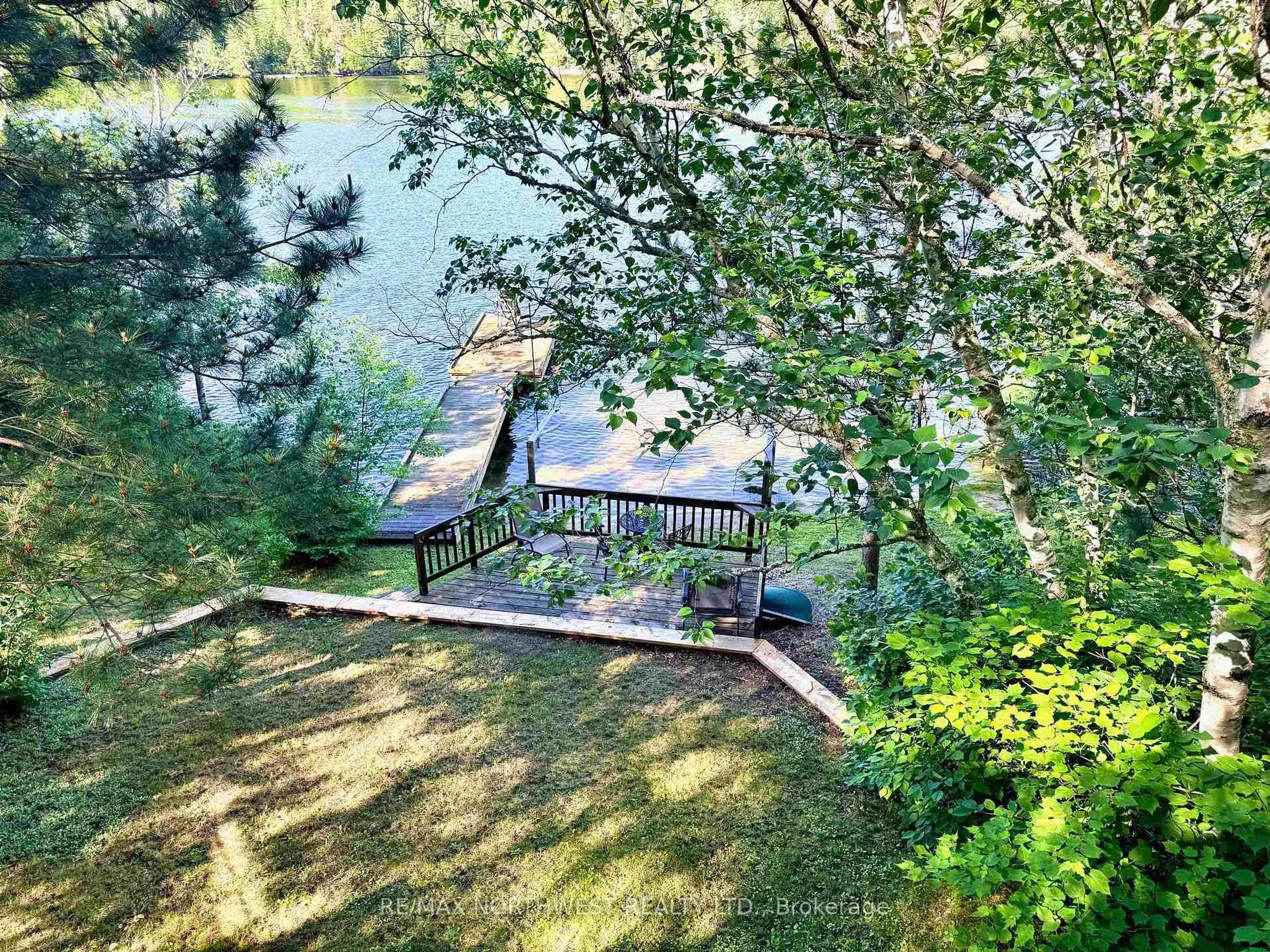 A pic from outside/outdoor area/front of a property/back of a property/a pic from drone, water/lake/river/ocean view for 60 Campbell Road, Kenora Ontario P9N 4N3