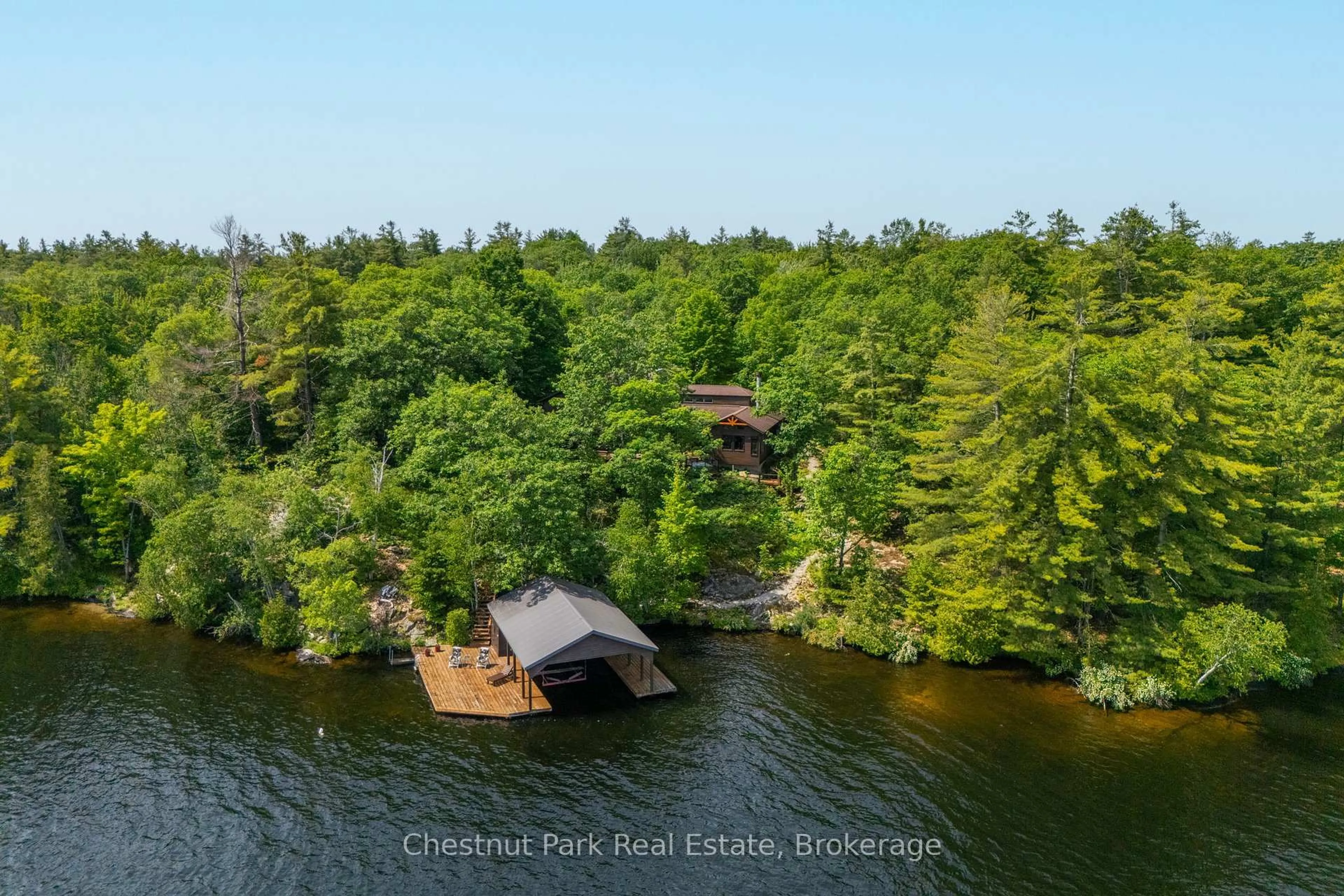 A pic from outside/outdoor area/front of a property/back of a property/a pic from drone, water/lake/river/ocean view for 257 Sweets Portage Rd, Georgian Bay Ontario L0K 1S0