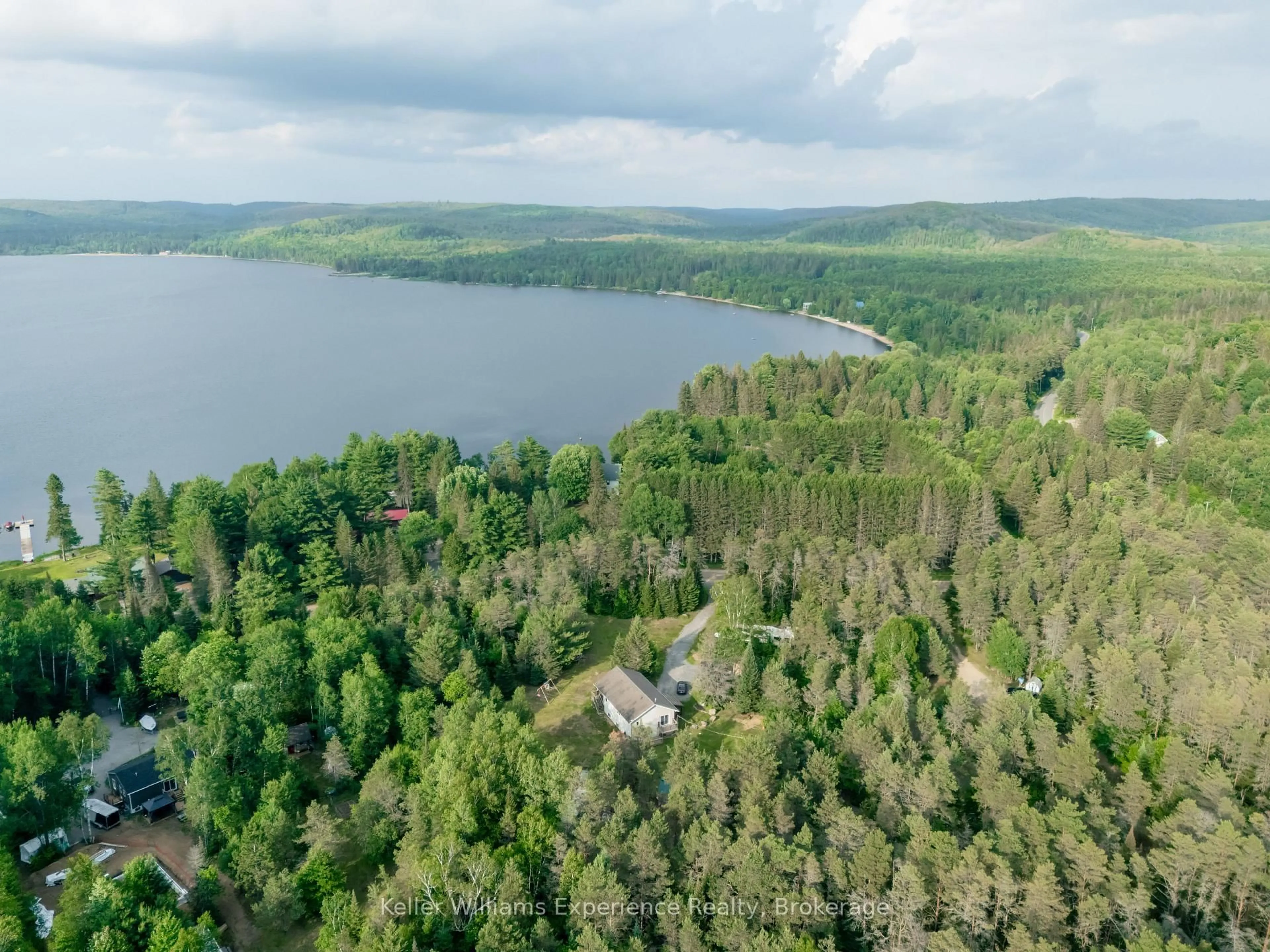 A pic from outside/outdoor area/front of a property/back of a property/a pic from drone, water/lake/river/ocean view for 235 Rock Point Rd, Kearney Ontario P0A 1M0