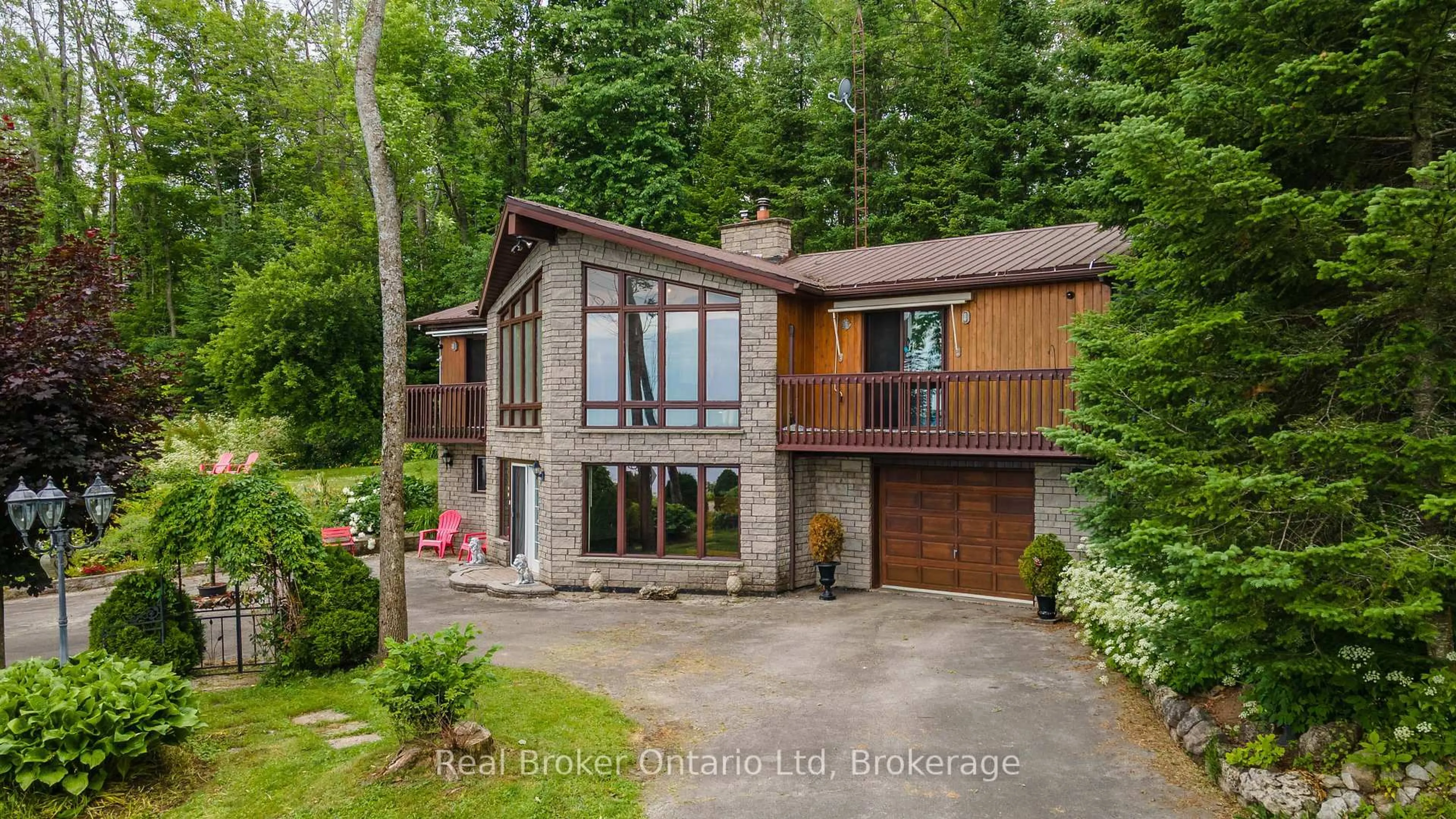 A pic from outside/outdoor area/front of a property/back of a property/a pic from drone, unknown for 339486 Presqu'ile Rd, Georgian Bluffs Ontario N0H 1S0