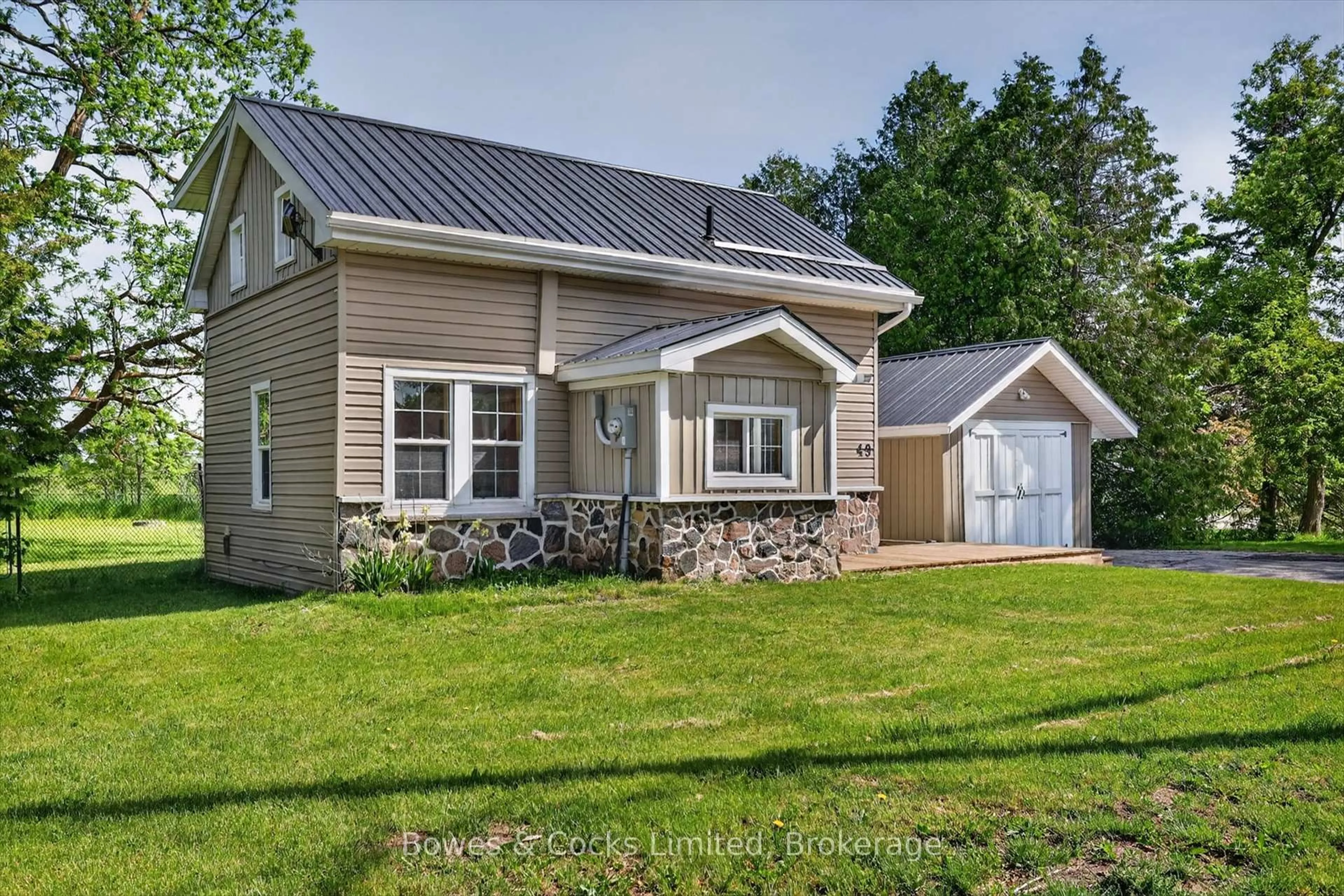 Home with vinyl exterior material, street for 49 Long Beach Rd, Kawartha Lakes Ontario K0M 1G0