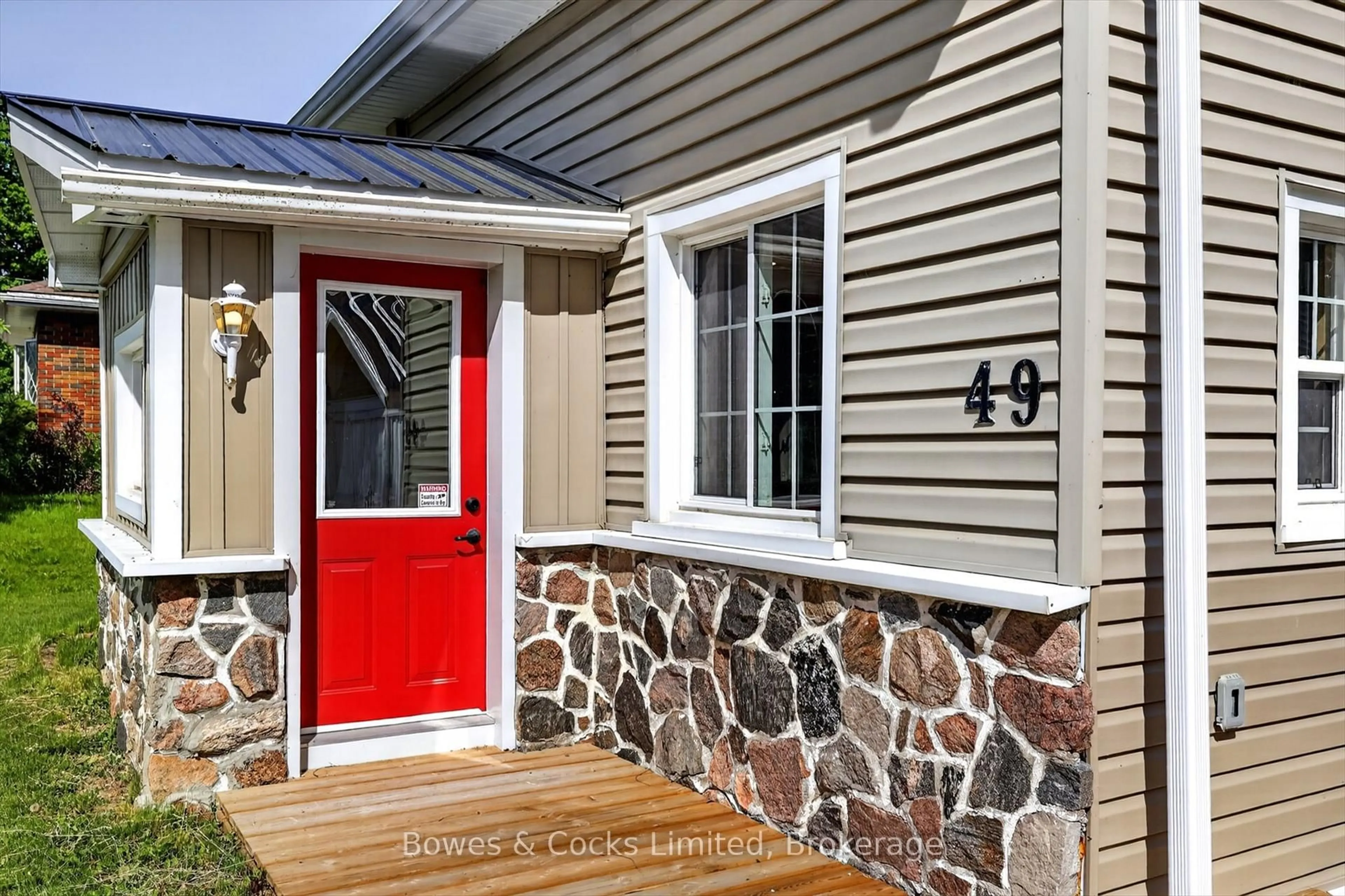 Home with vinyl exterior material, street for 49 Long Beach Rd, Kawartha Lakes Ontario K0M 1G0