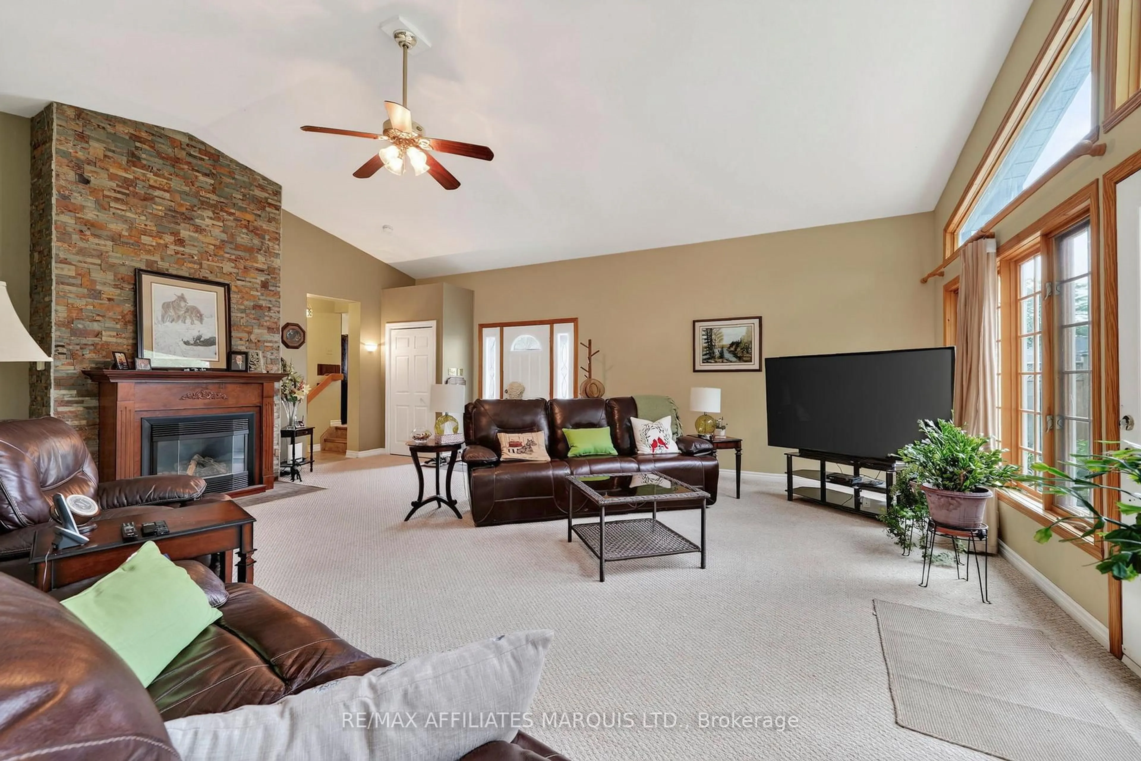 Living room with furniture, ceramic/tile floor for 1489 Holy Cross Blvd, Cornwall Ontario K6H 2W9