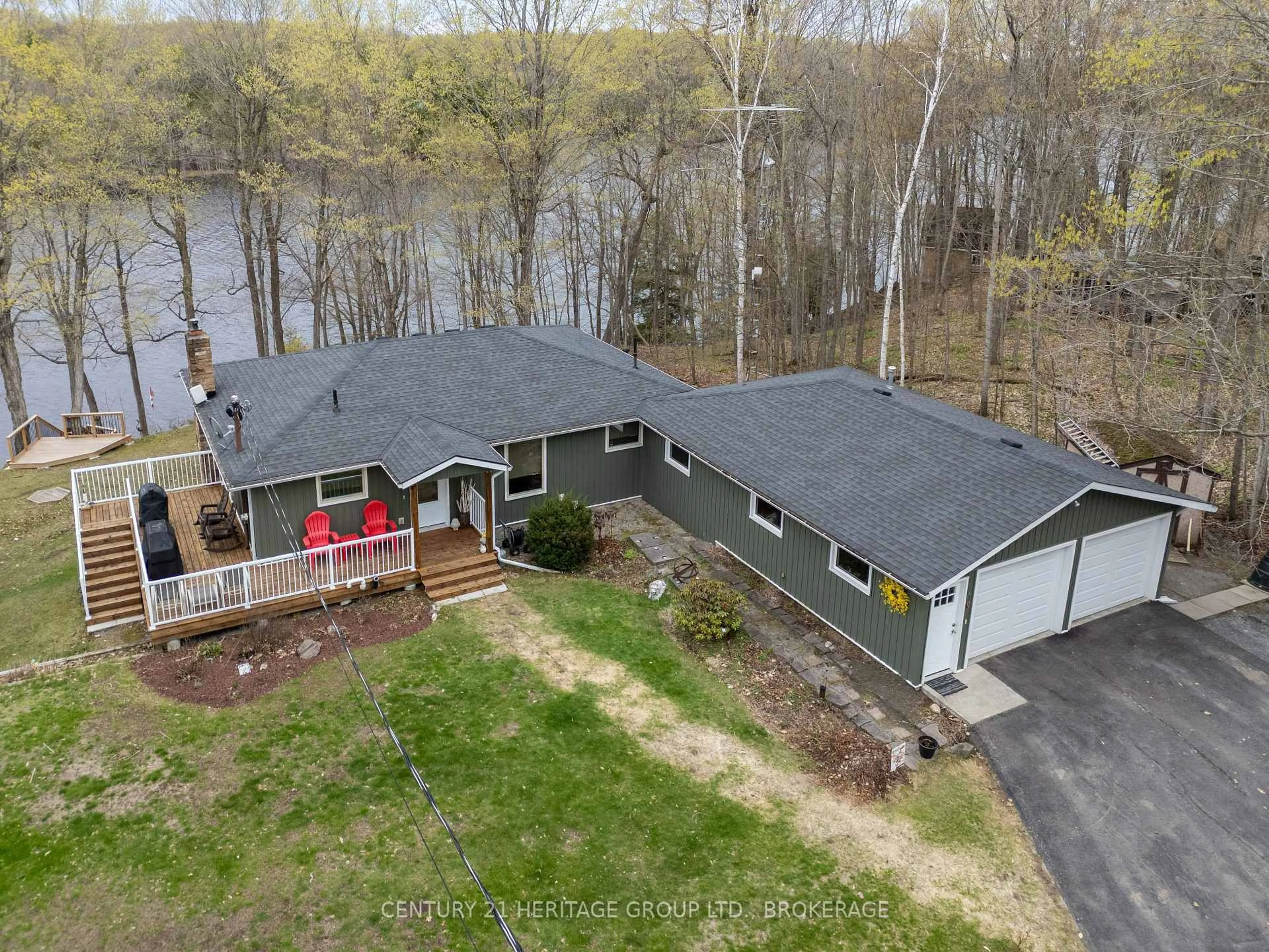 A pic from outside/outdoor area/front of a property/back of a property/a pic from drone, water/lake/river/ocean view for 2097 Hambly Lane, Hartington Ontario K0H 1W0