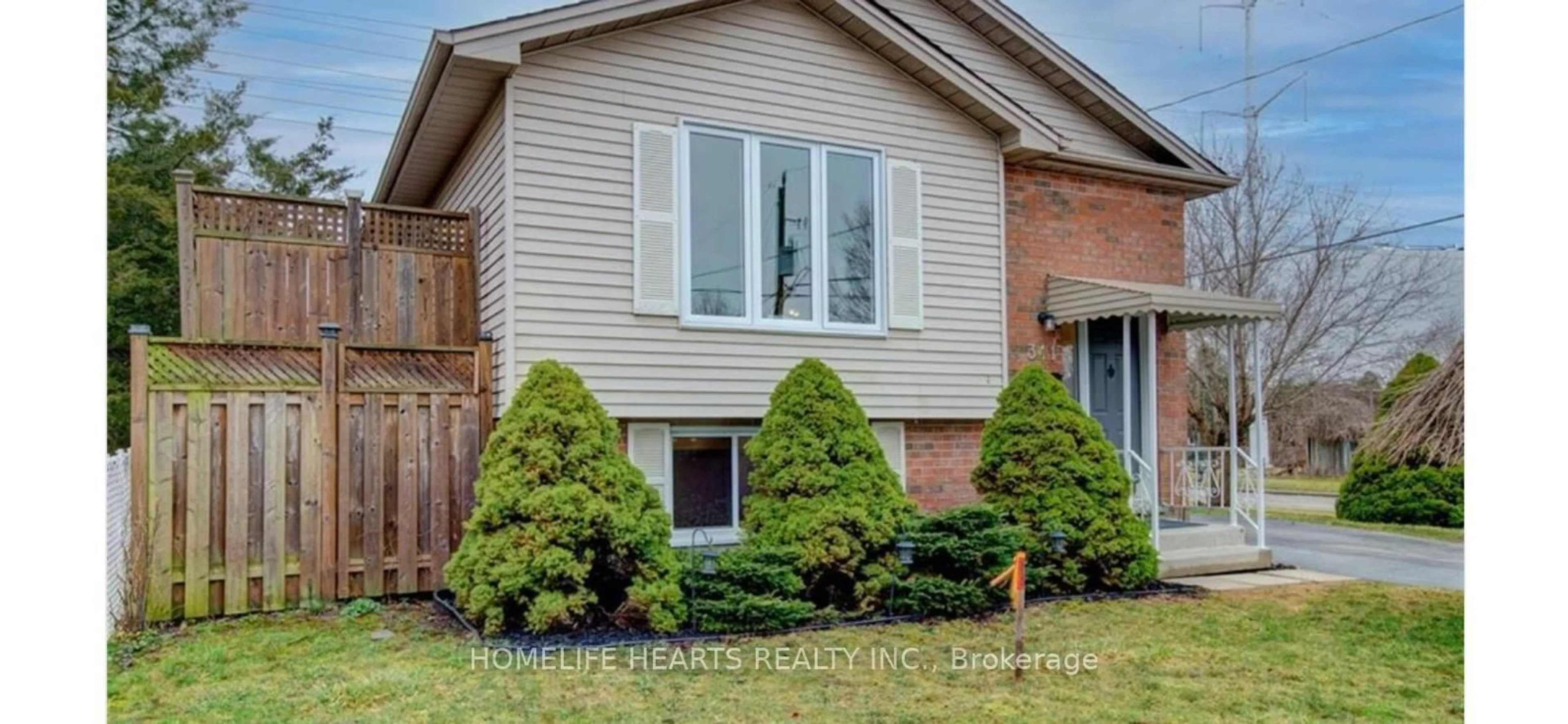 Home with brick exterior material, street for 311 Saskatoon St, London East Ontario N5W 6A3
