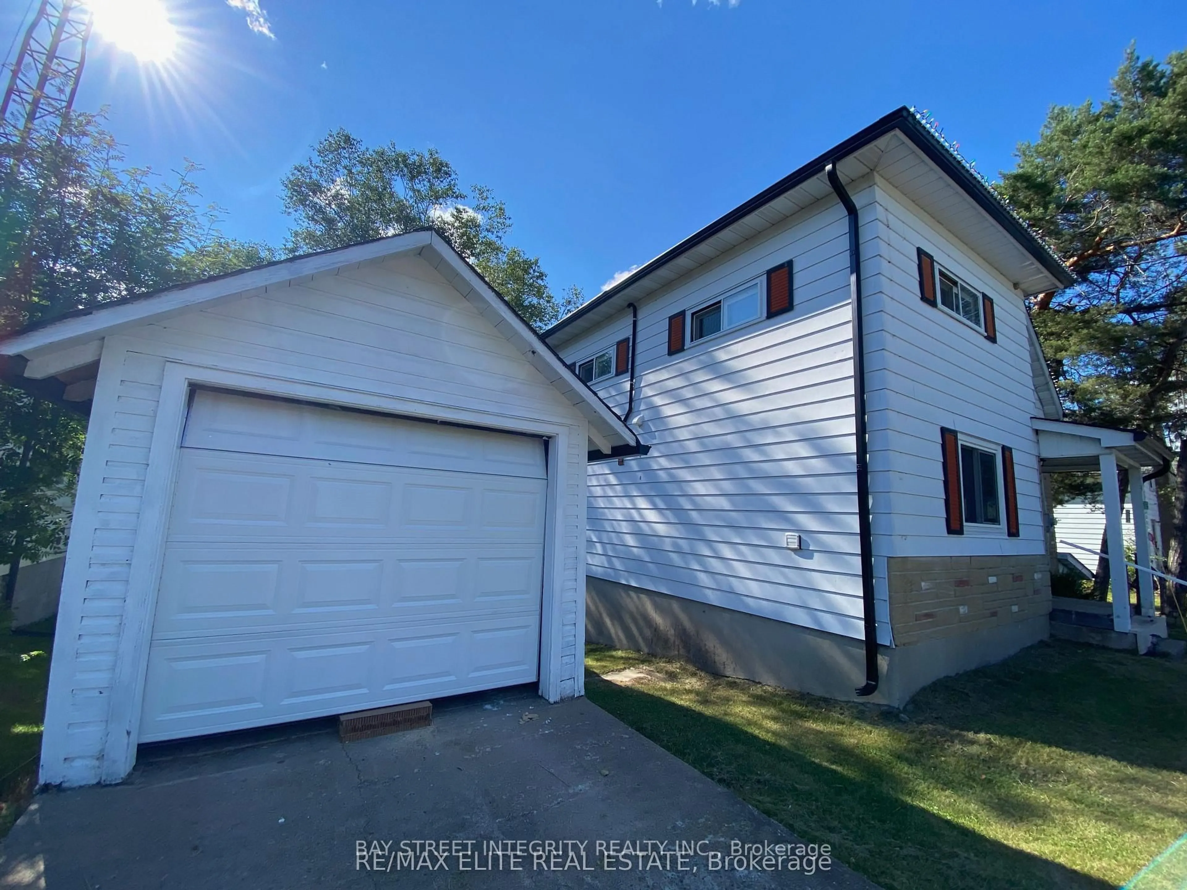 A pic from outside/outdoor area/front of a property/back of a property/a pic from drone, street for 62 Ottawa St, South Algonquin Ontario K0J 2M0