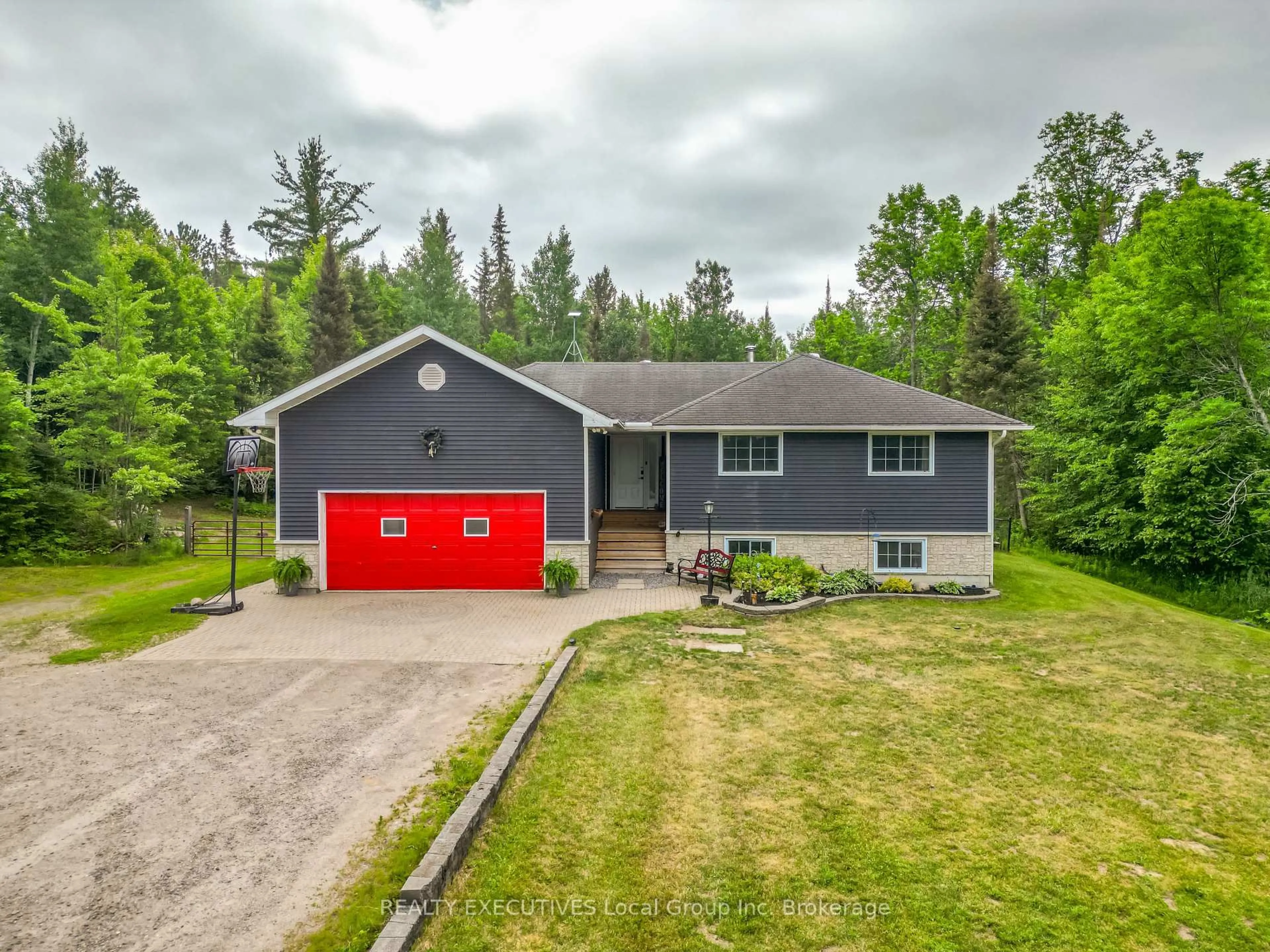 A pic from outside/outdoor area/front of a property/back of a property/a pic from drone, street for 863 Highway 654, Callander Ontario P0H 1H0