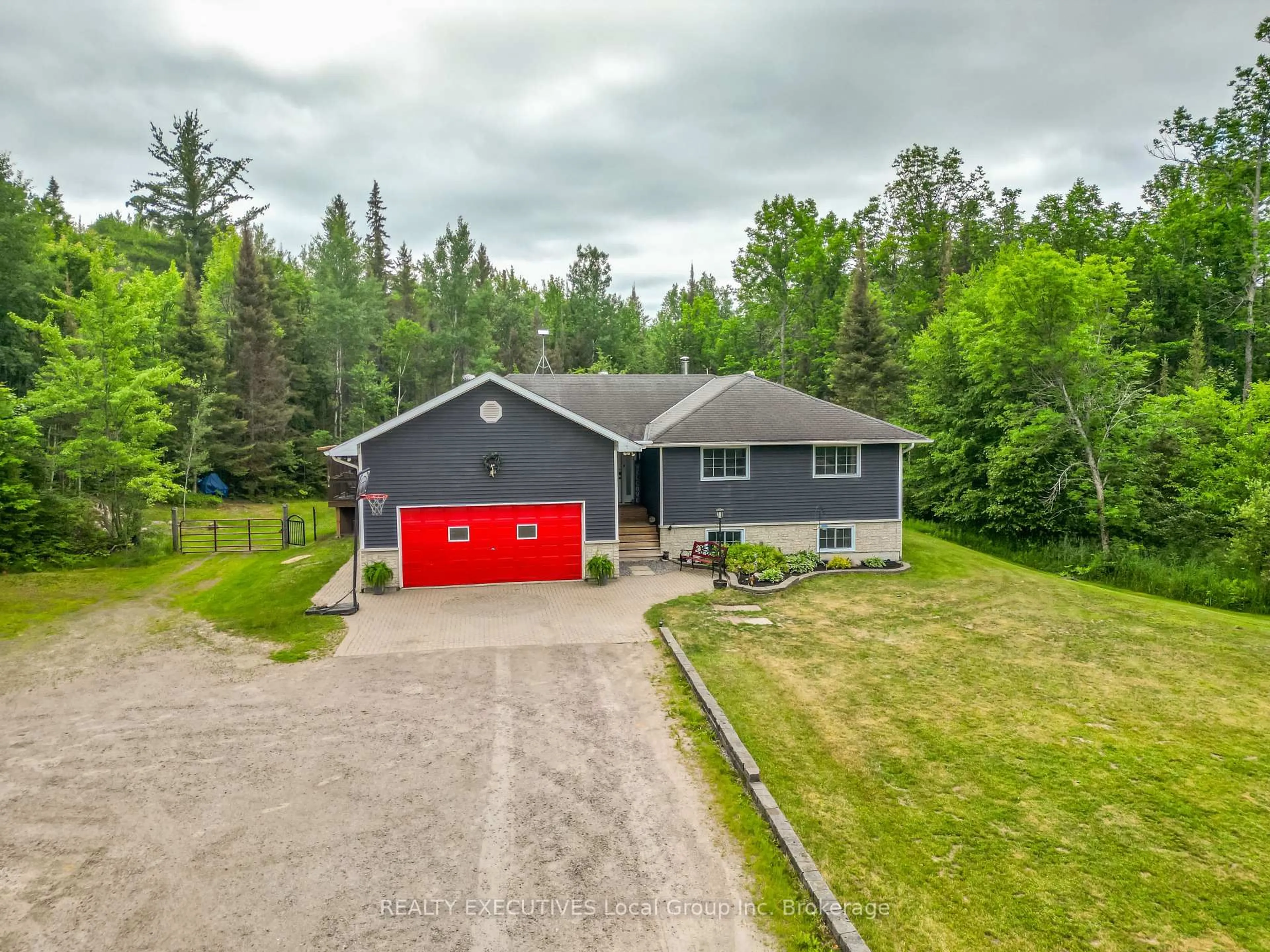 A pic from outside/outdoor area/front of a property/back of a property/a pic from drone, street for 863 Highway 654, Callander Ontario P0H 1H0