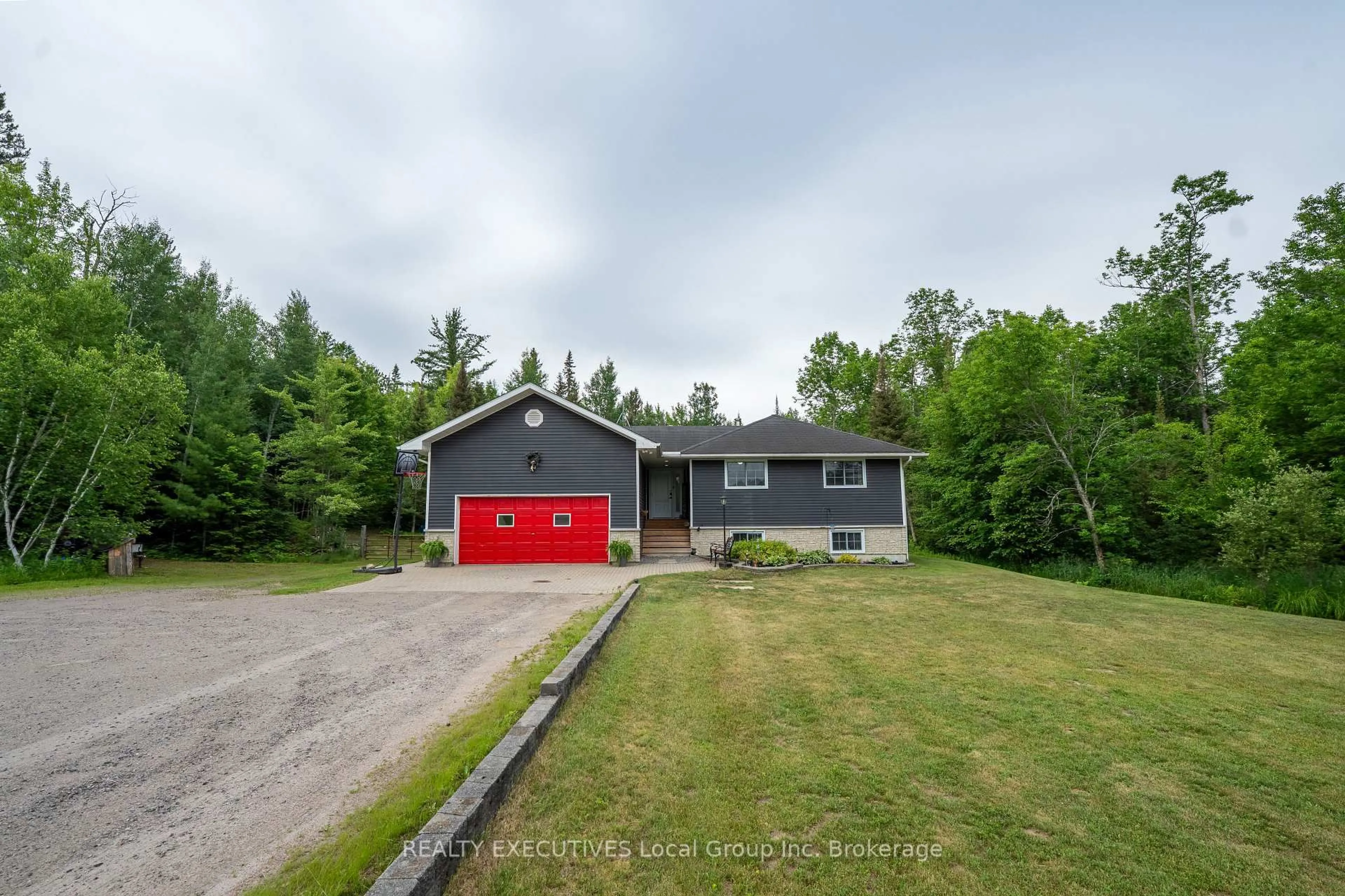A pic from outside/outdoor area/front of a property/back of a property/a pic from drone, street for 863 Highway 654, Callander Ontario P0H 1H0