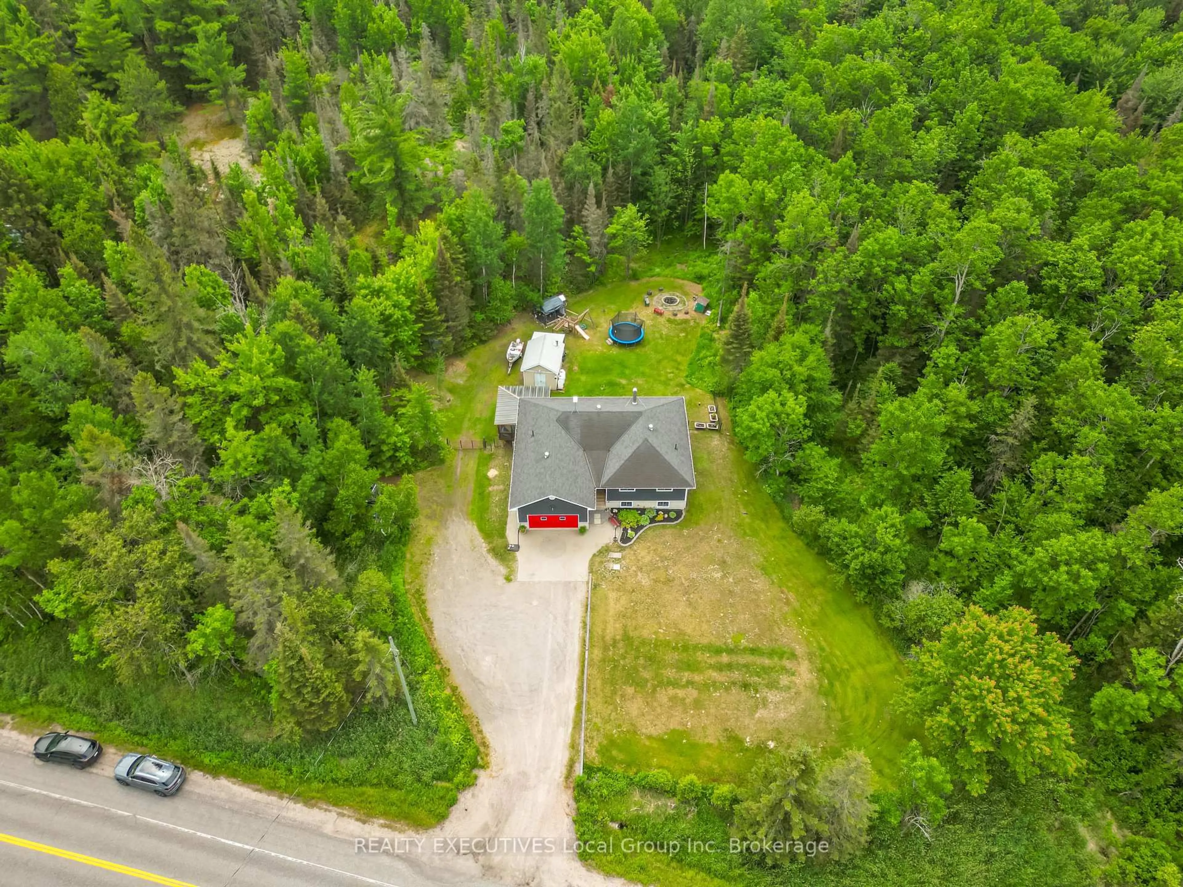 A pic from outside/outdoor area/front of a property/back of a property/a pic from drone, unknown for 863 Highway 654, Callander Ontario P0H 1H0