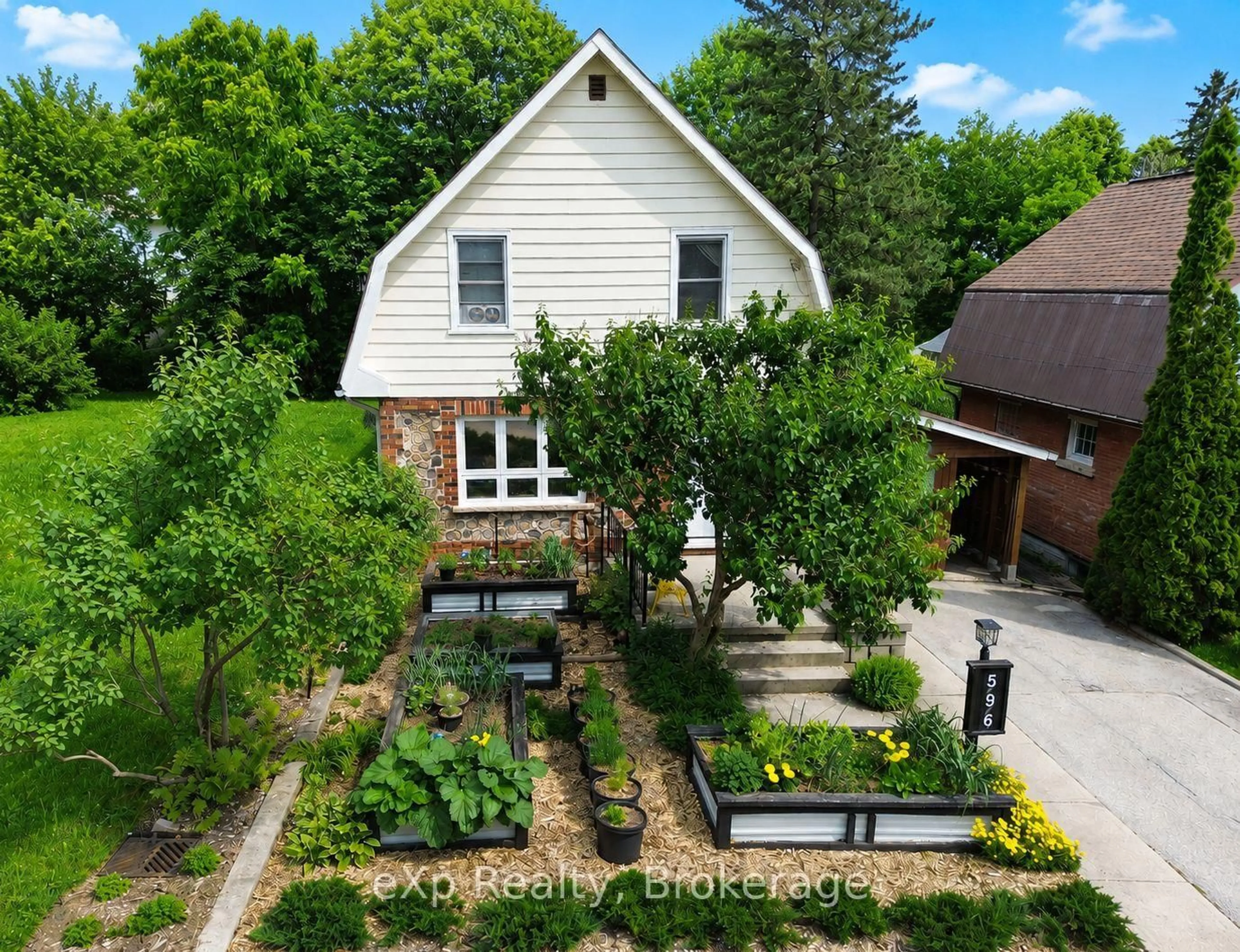 A pic from outside/outdoor area/front of a property/back of a property/a pic from drone, street for 596 13th A St, Owen Sound Ontario N4K 3X4