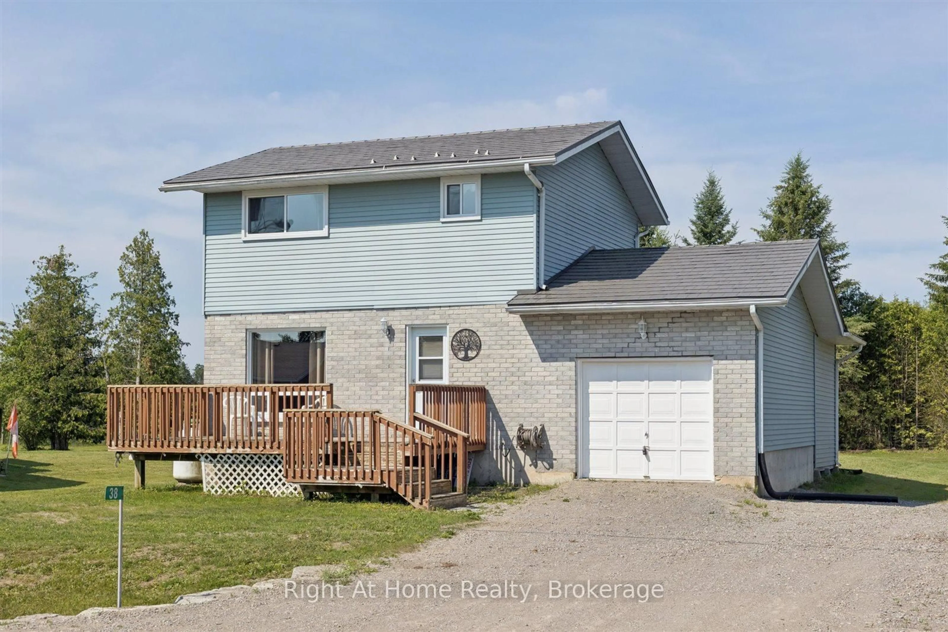 Home with vinyl exterior material, street for 38 Trent River Rd, Kawartha Lakes Ontario K0M 2T0