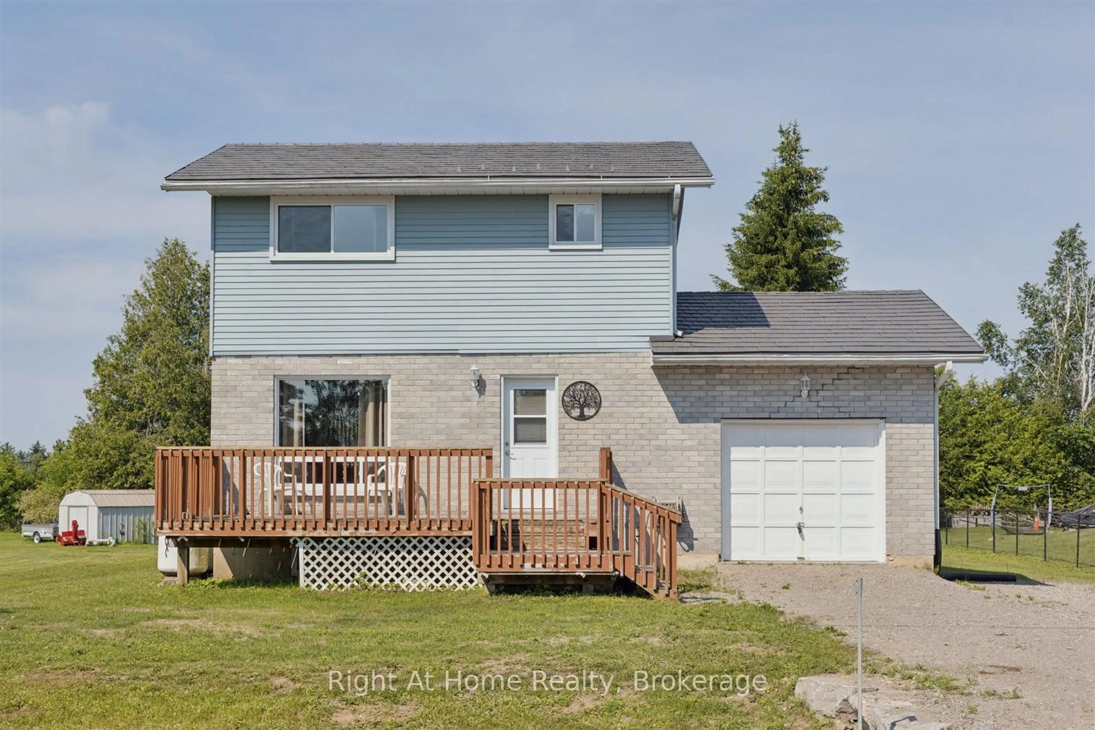 Home with vinyl exterior material, street for 38 Trent River Rd, Kawartha Lakes Ontario K0M 2T0