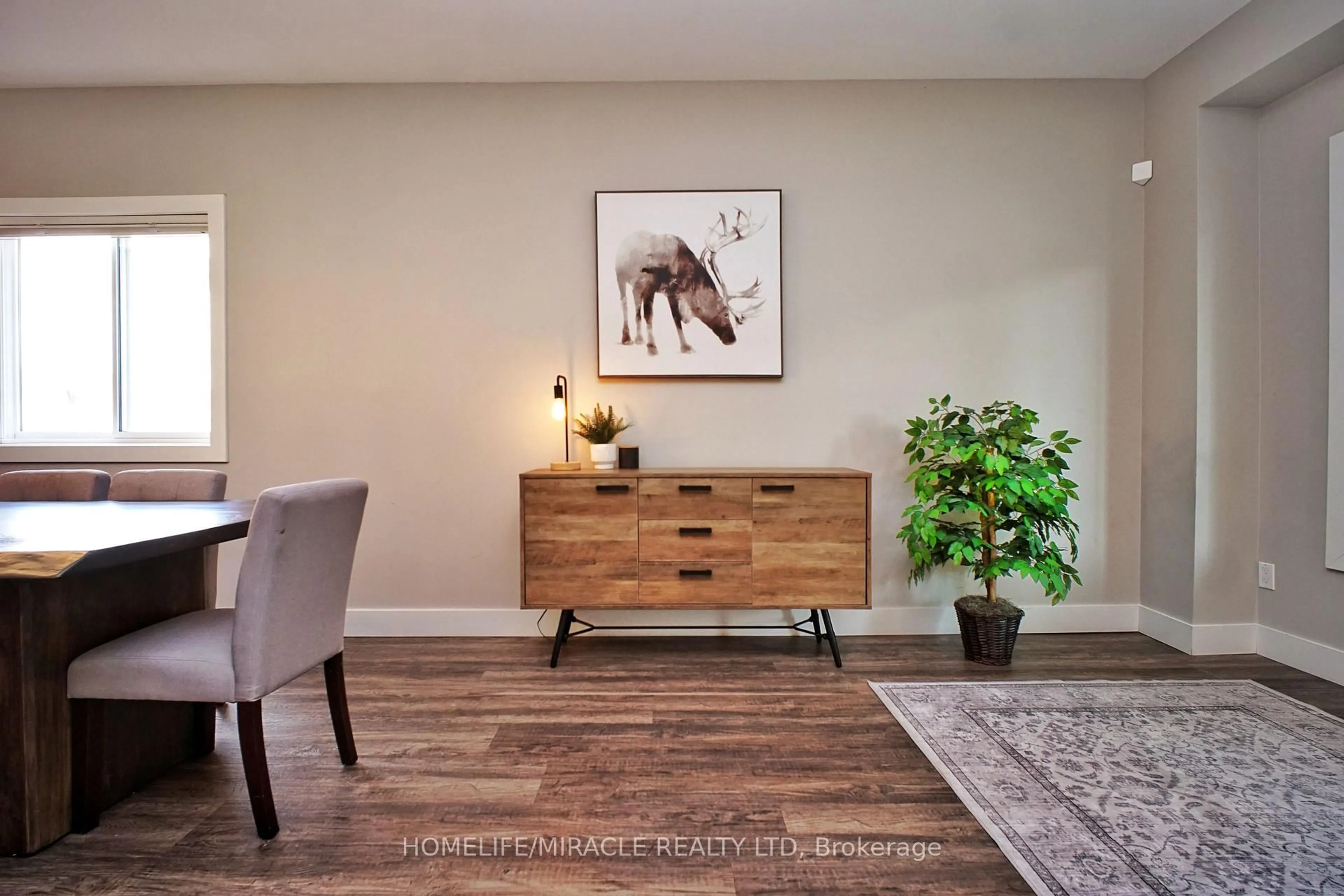 Living room with furniture, wood/laminate floor for 40 Mccormick Dr, Cambridge Ontario N3C 4C9