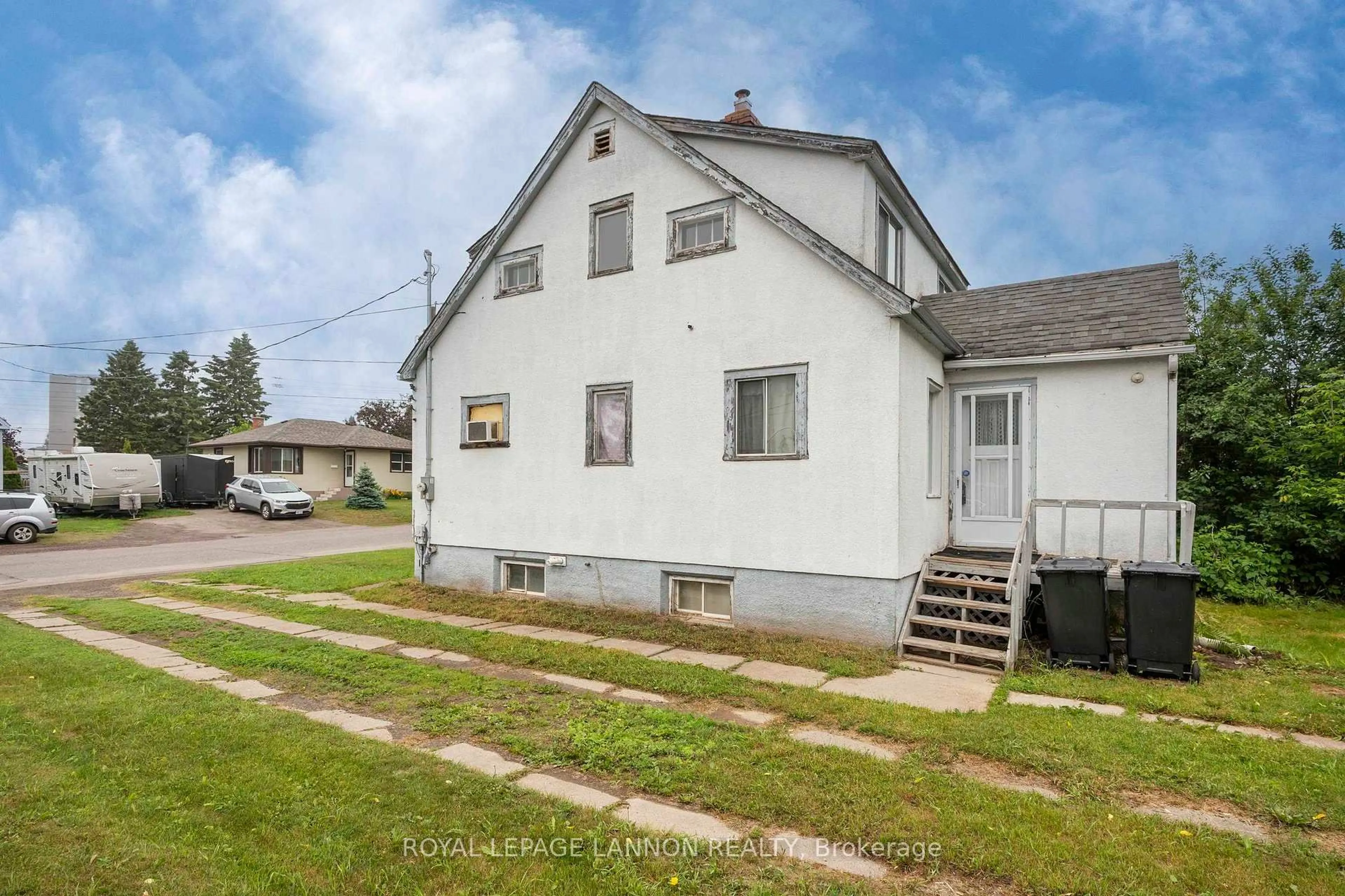 A pic from outside/outdoor area/front of a property/back of a property/a pic from drone, street for 65 Kenogami Ave. N., Thunder Bay Ontario P7A 6C8