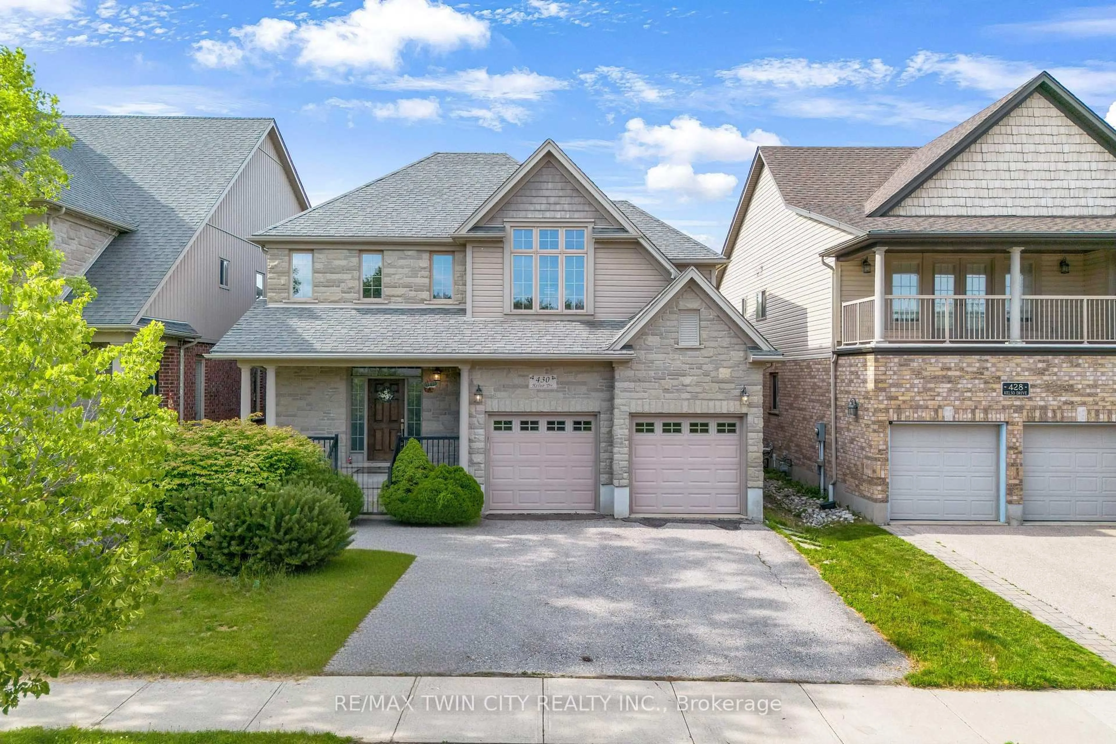 Home with brick exterior material, street for 430 Kelso Dr, Waterloo Ontario N2V 2S1