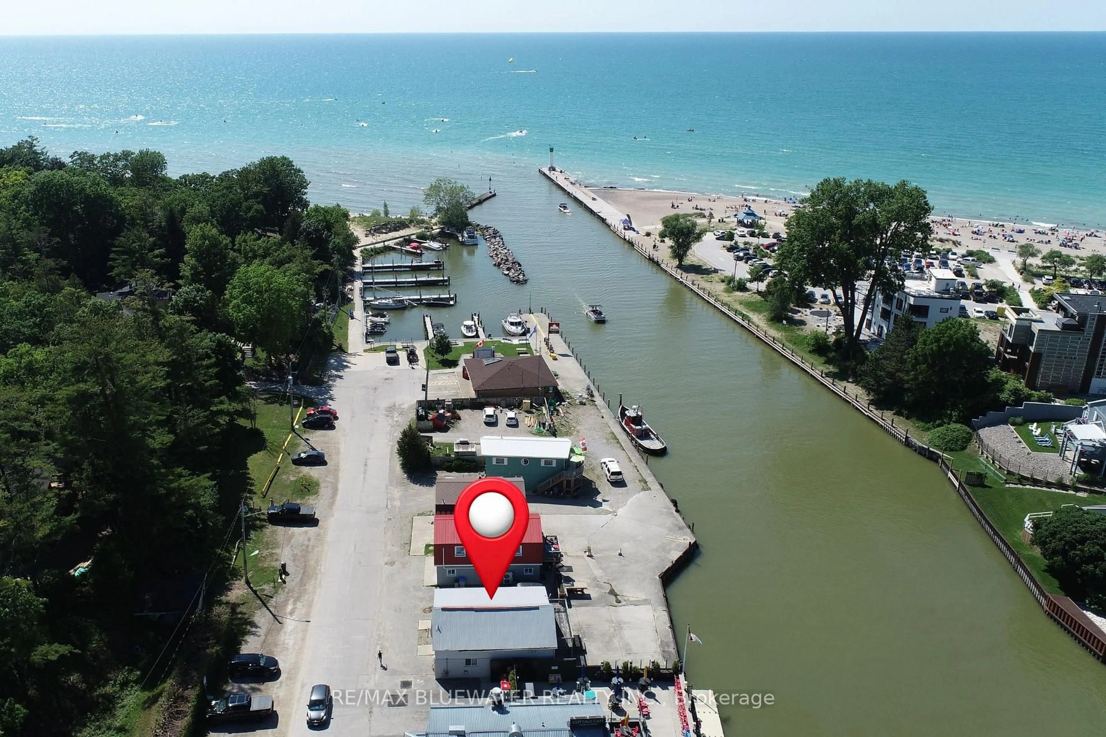 A pic from outside/outdoor area/front of a property/back of a property/a pic from drone, water/lake/river/ocean view for 75 River Rd, Lambton Shores Ontario N0M 1T0