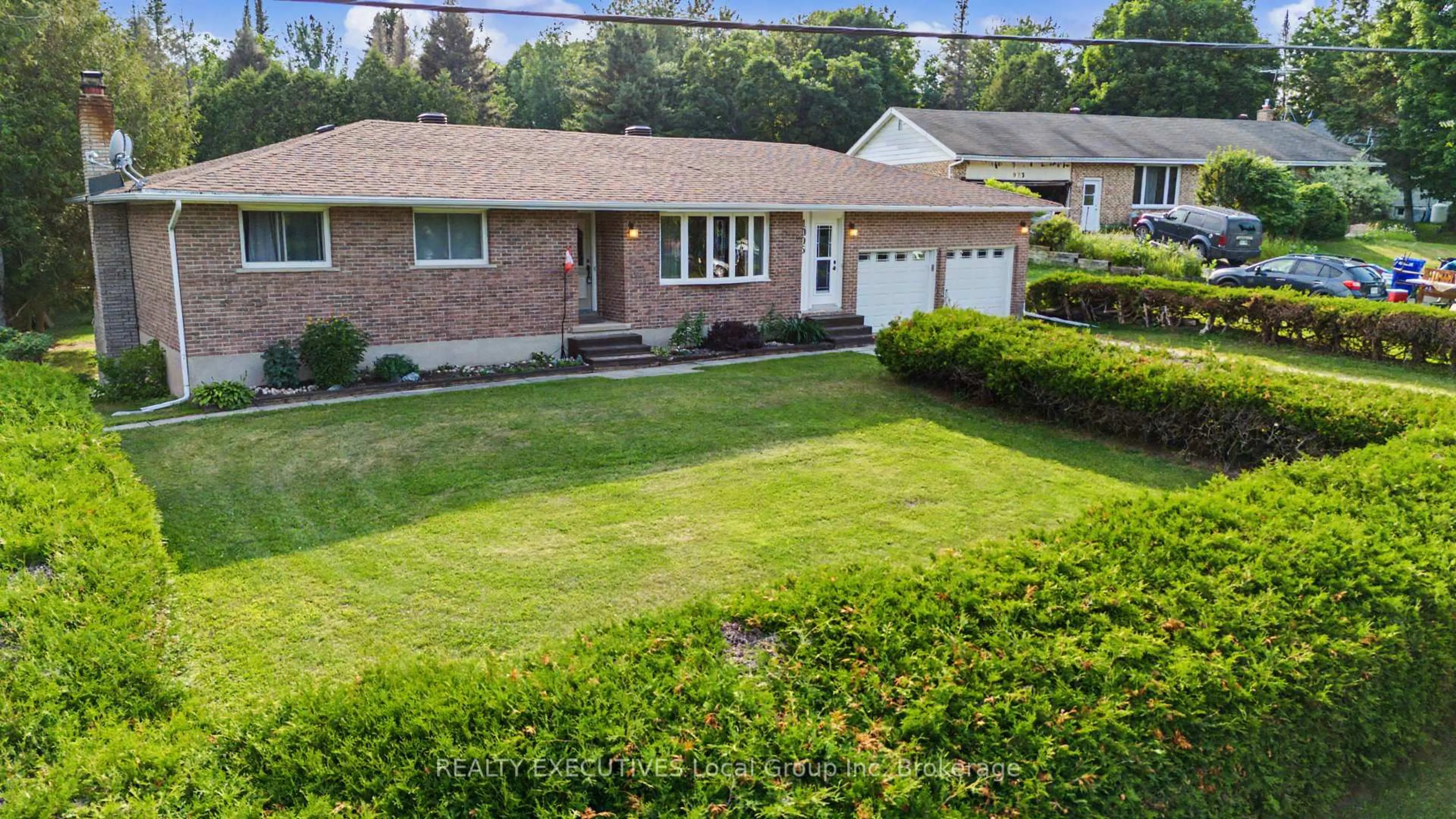 A pic from outside/outdoor area/front of a property/back of a property/a pic from drone, street for 1005 PINECREEK Rd, Callander Ontario P0H 1H0