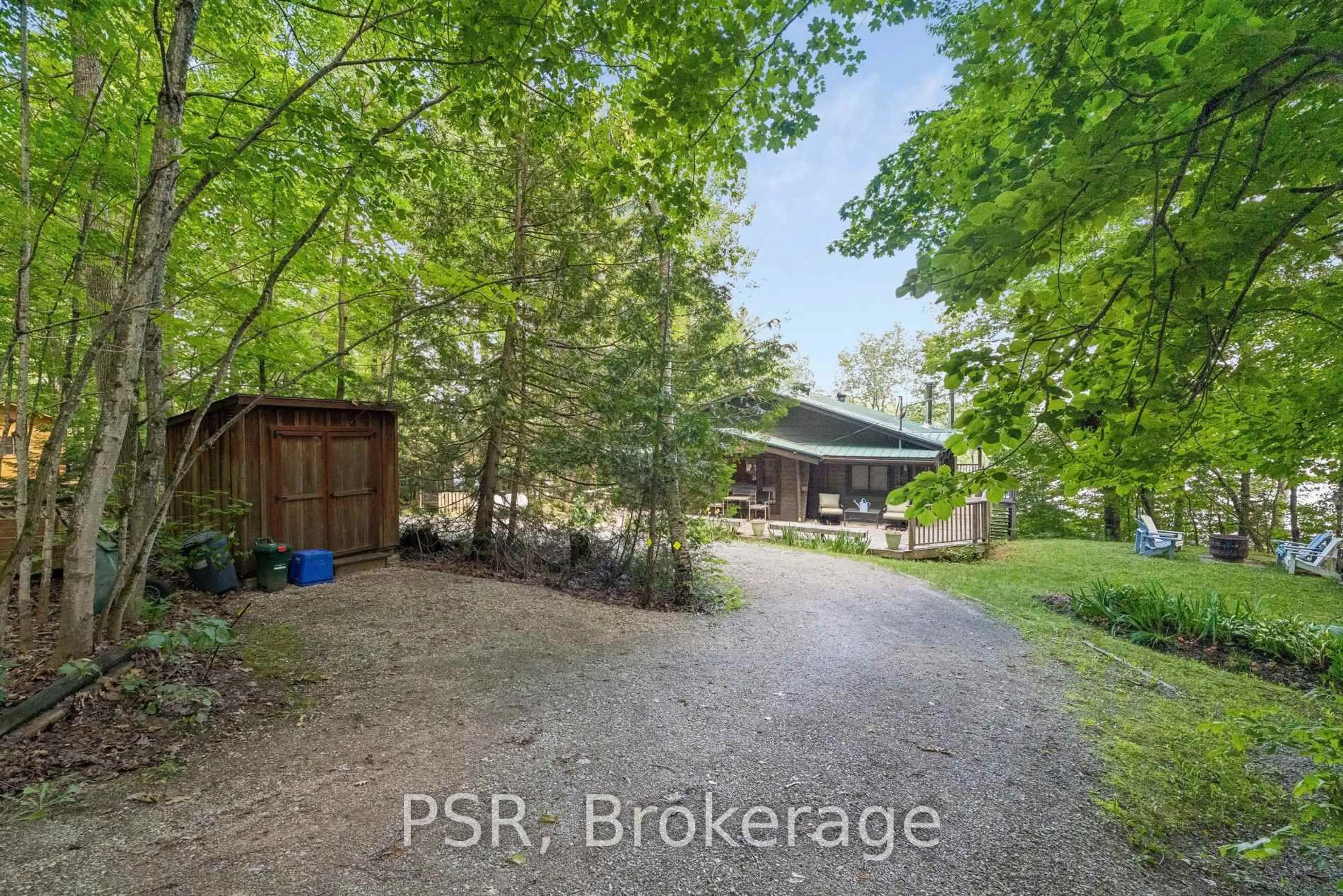 A pic from outside/outdoor area/front of a property/back of a property/a pic from drone, forest/trees view for 1158 Shea Rd #17, Muskoka Lakes Ontario P0B 1M0
